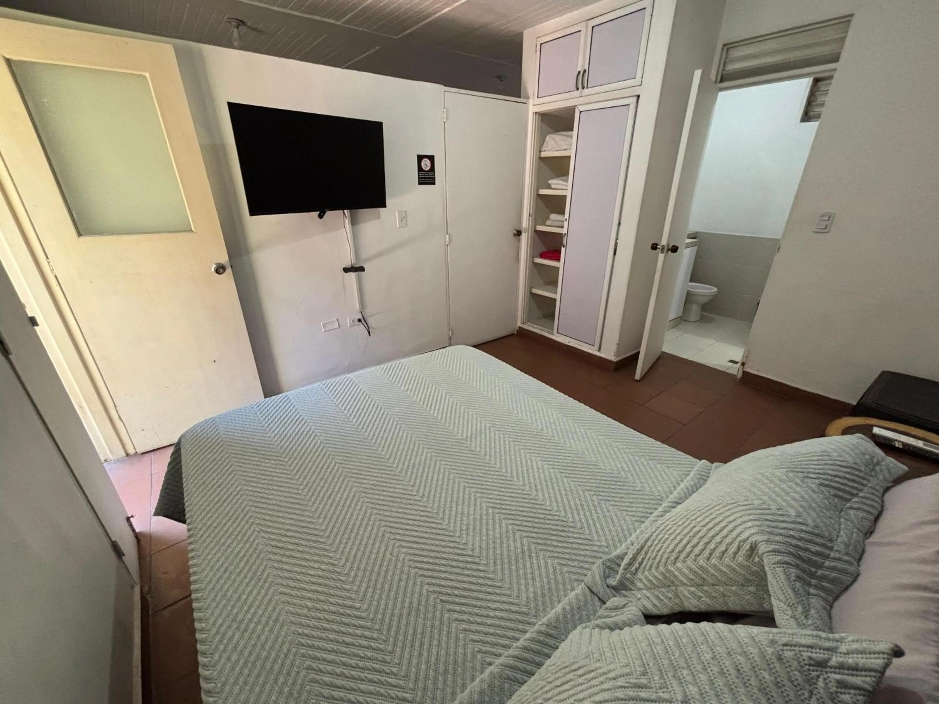 Bed in OUR HOME SAN ANTONIO