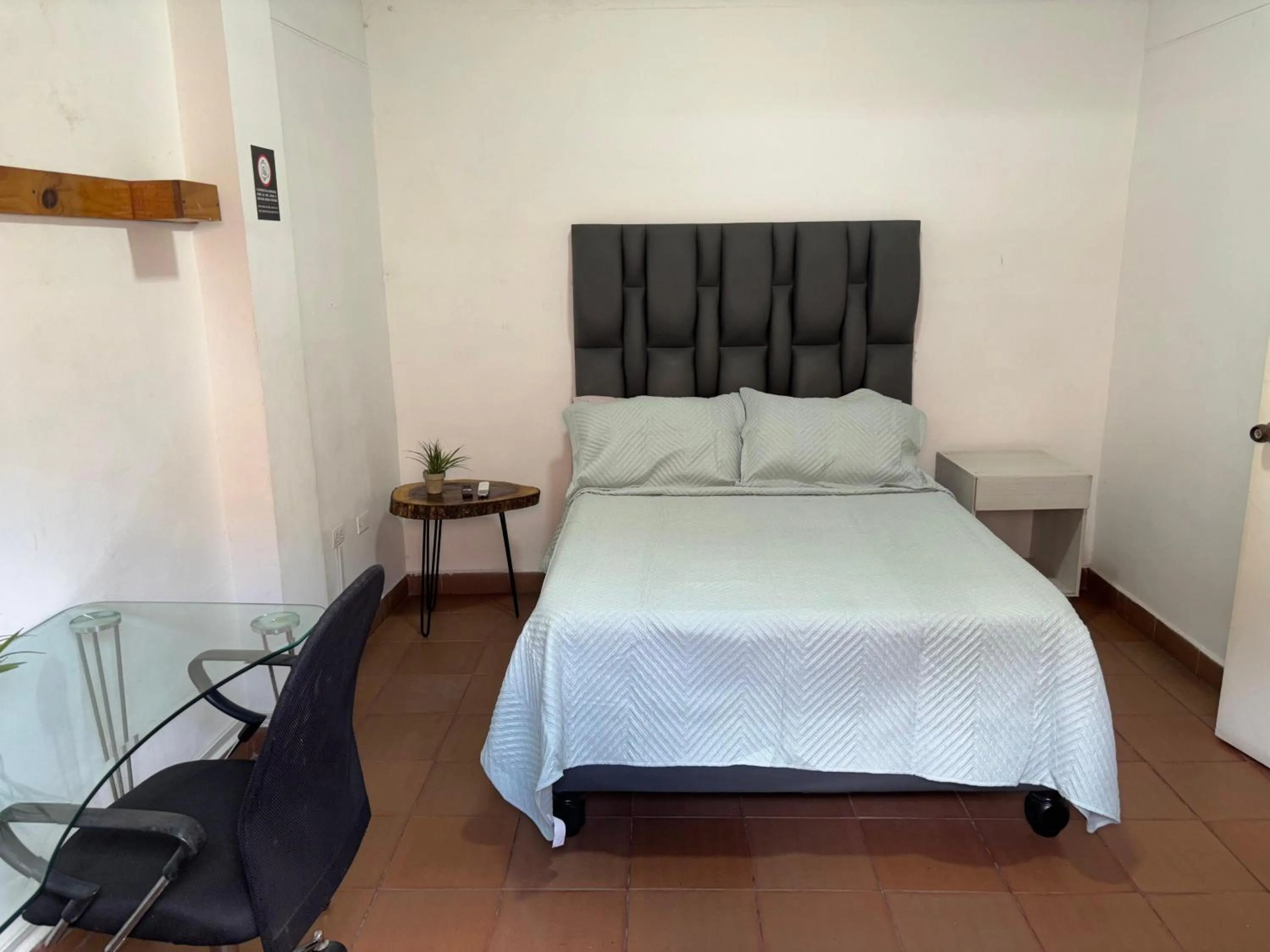 Bed in OUR HOME SAN ANTONIO