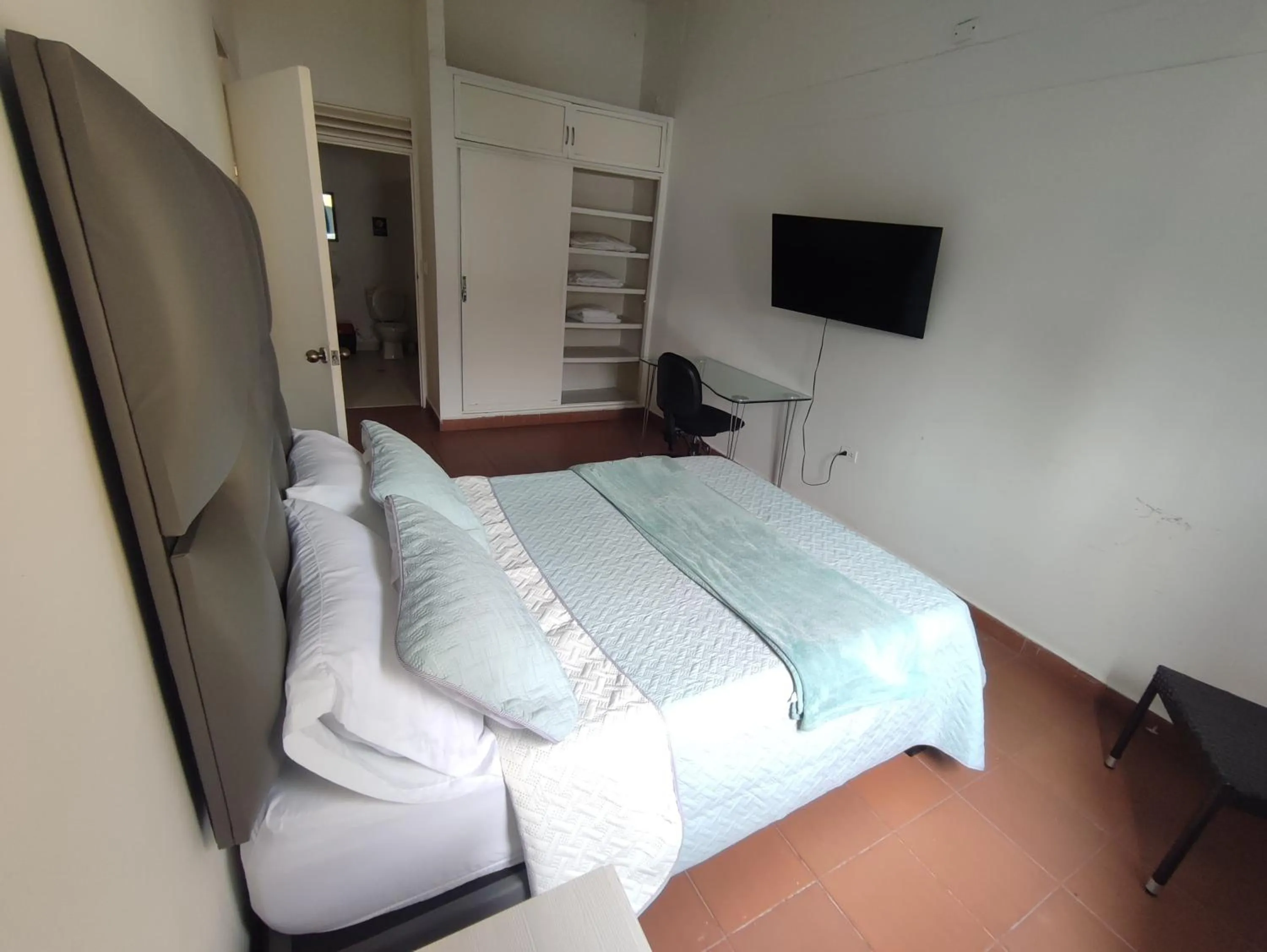 Bed in OUR HOME SAN ANTONIO