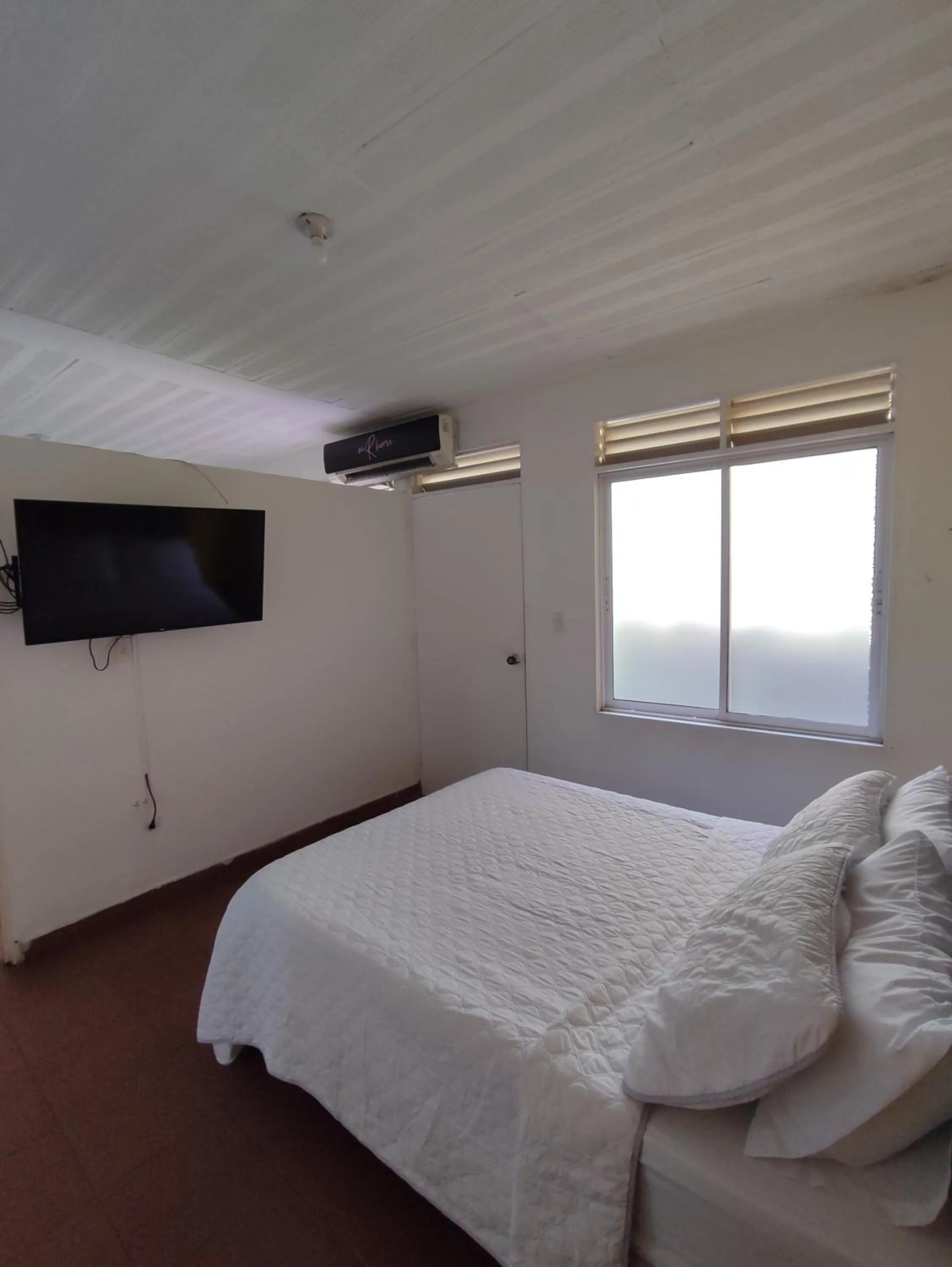 Bed in OUR HOME SAN ANTONIO