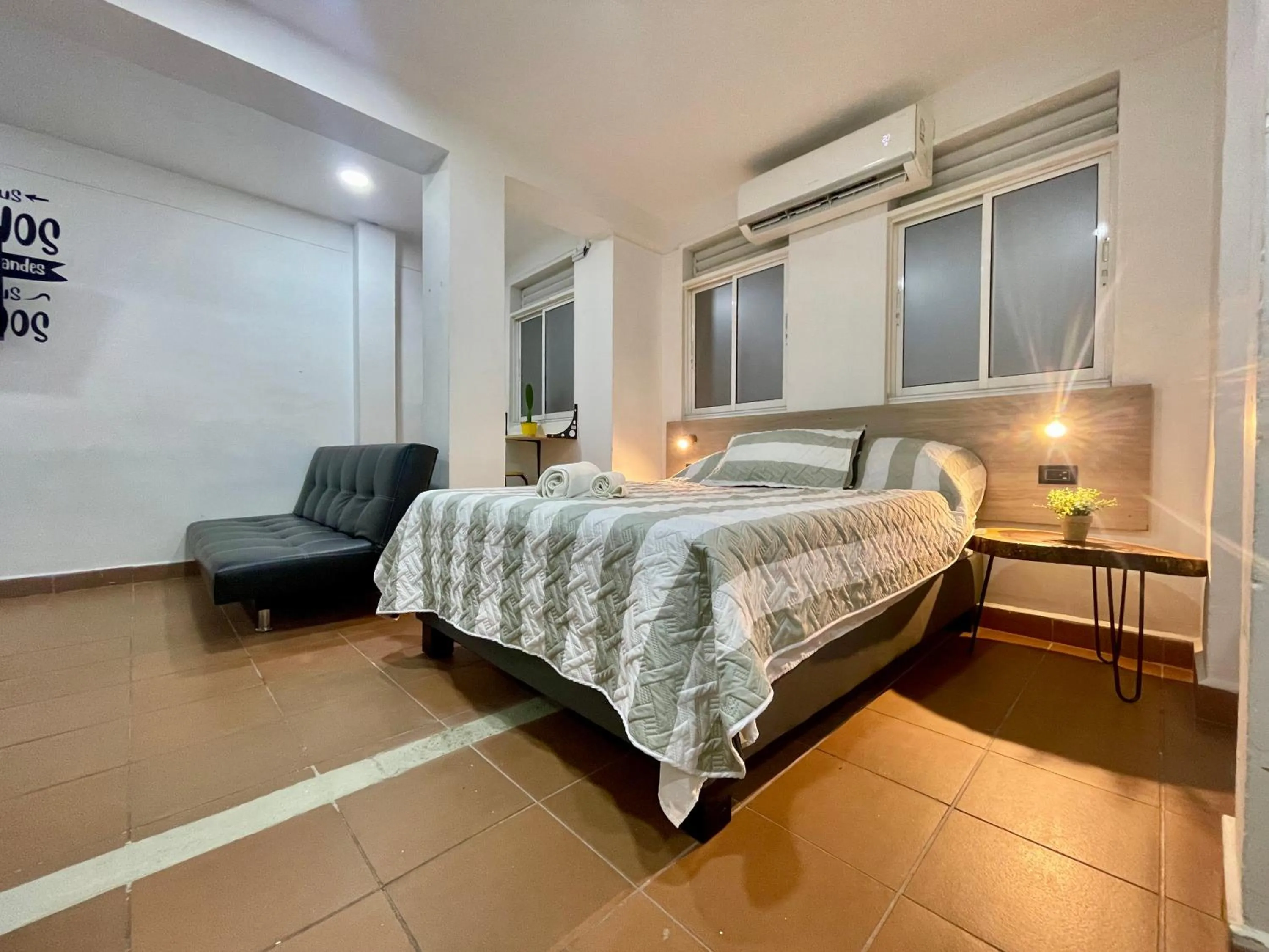 Bed in OUR HOME SAN ANTONIO