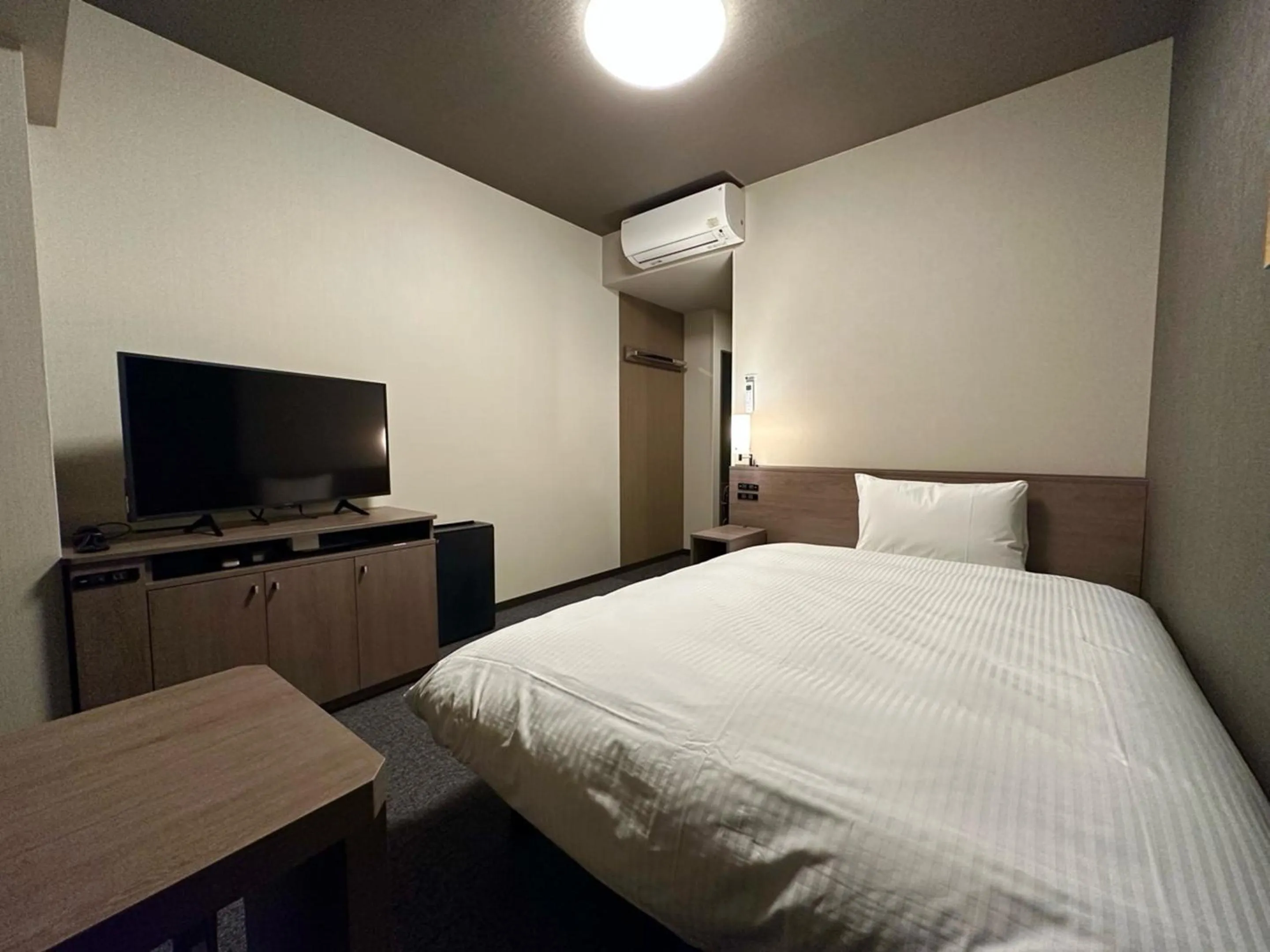 Photo of the whole room, Bed in Hotel Route Inn Numata