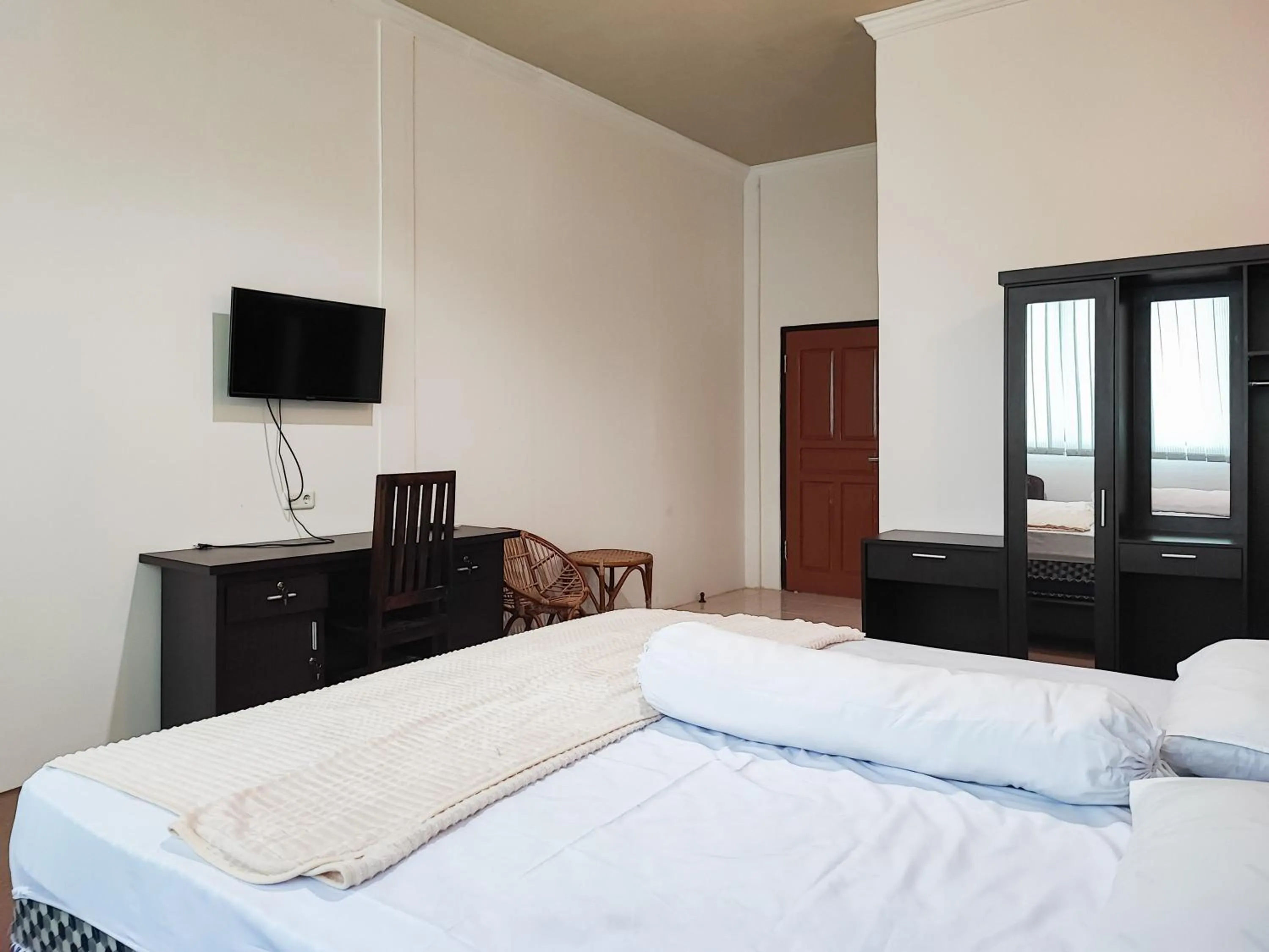 Bed in RedDoorz Plus Syariah near Simpang Rimbo Jambi 2