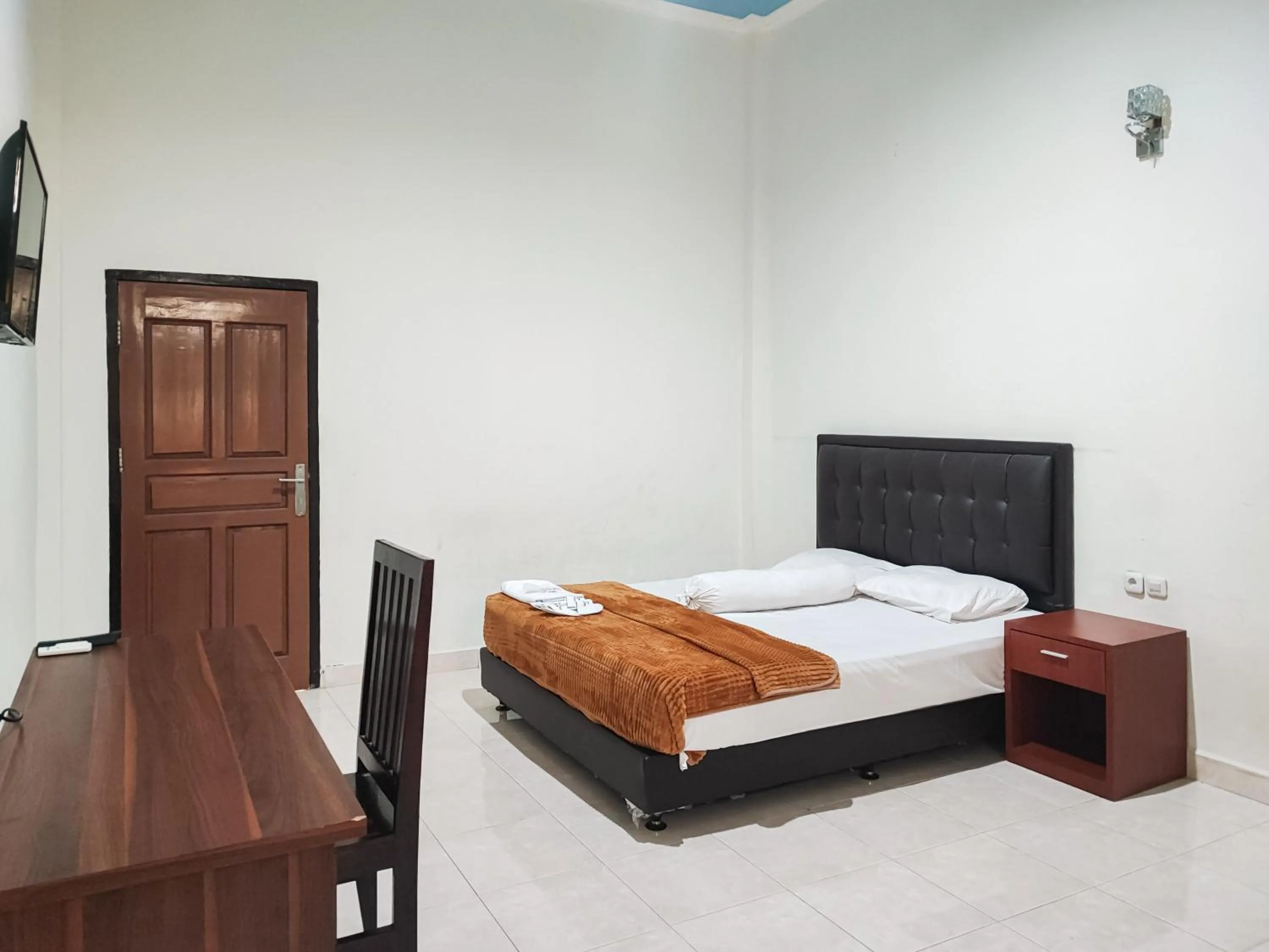 Bed in RedDoorz Plus Syariah near Simpang Rimbo Jambi 2