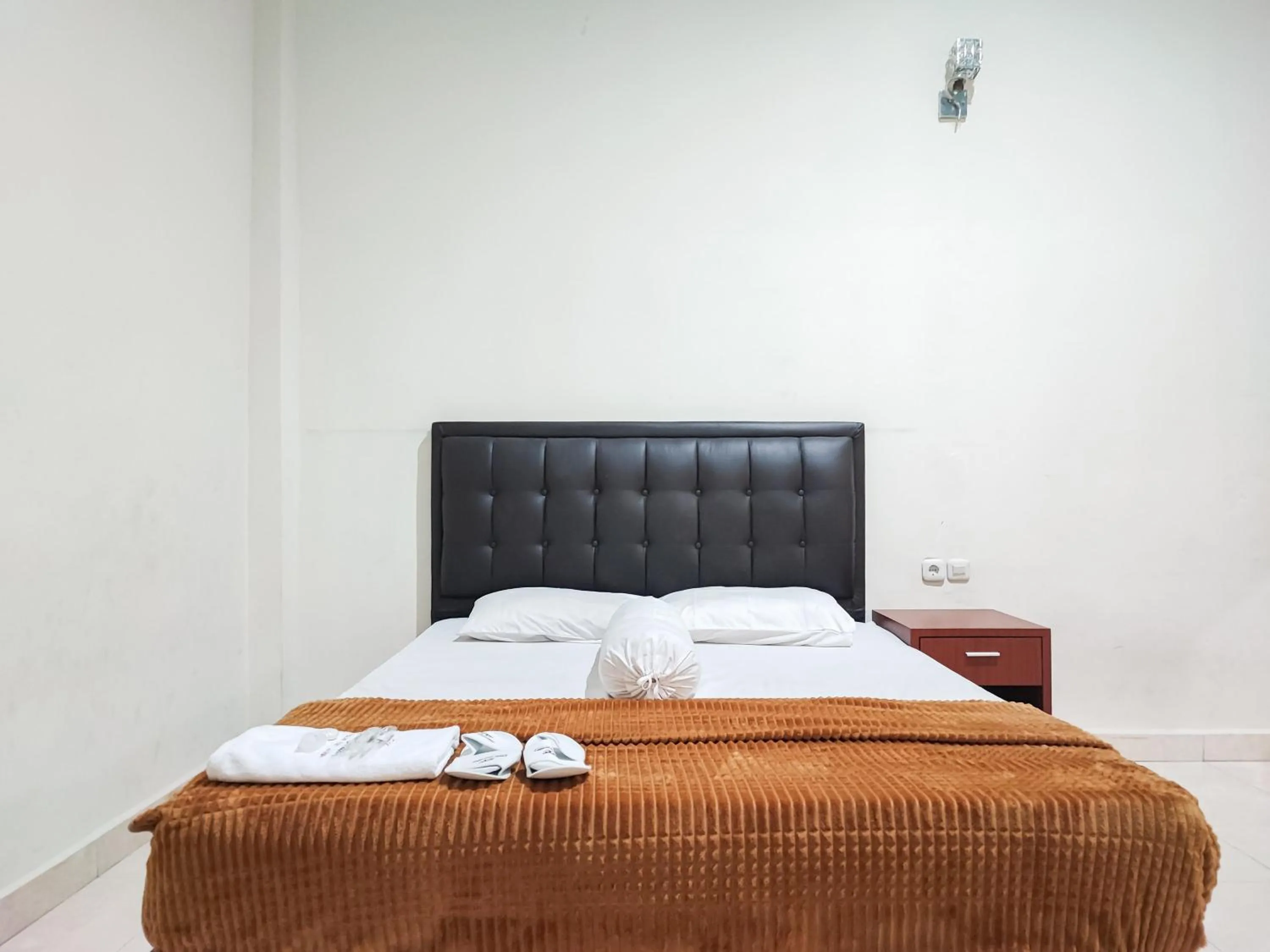 Bed in RedDoorz Plus Syariah near Simpang Rimbo Jambi 2