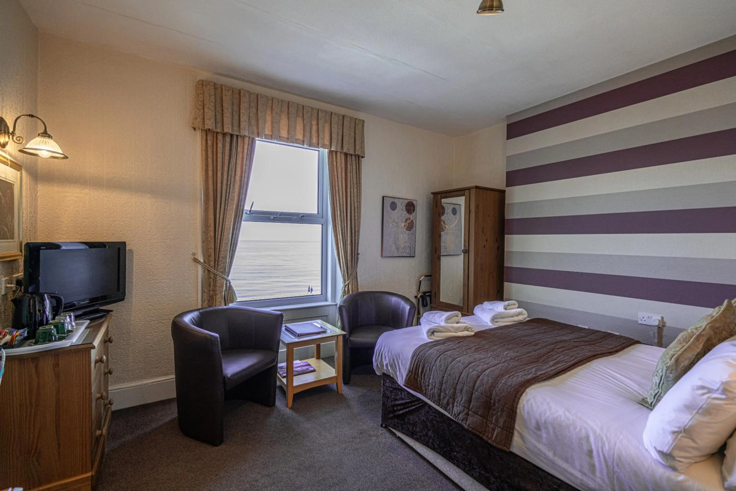 Bed in Can-Y-Bae Hotel