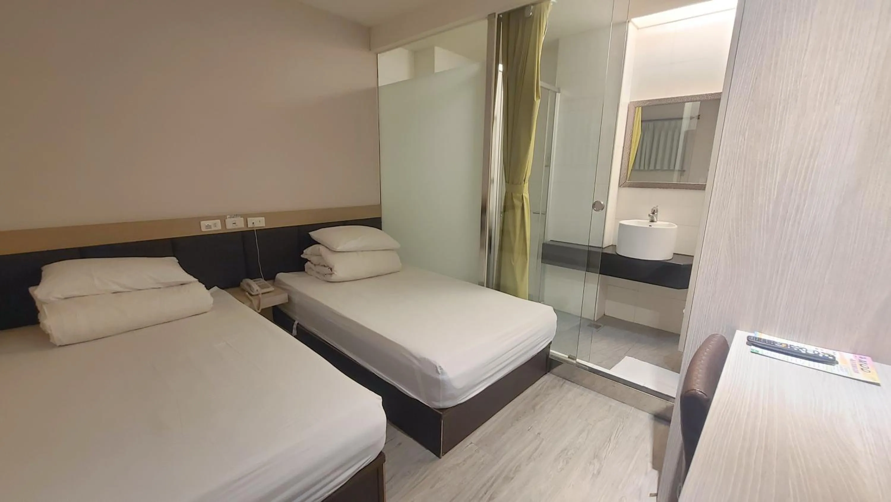 Bed in Chao She Hotel