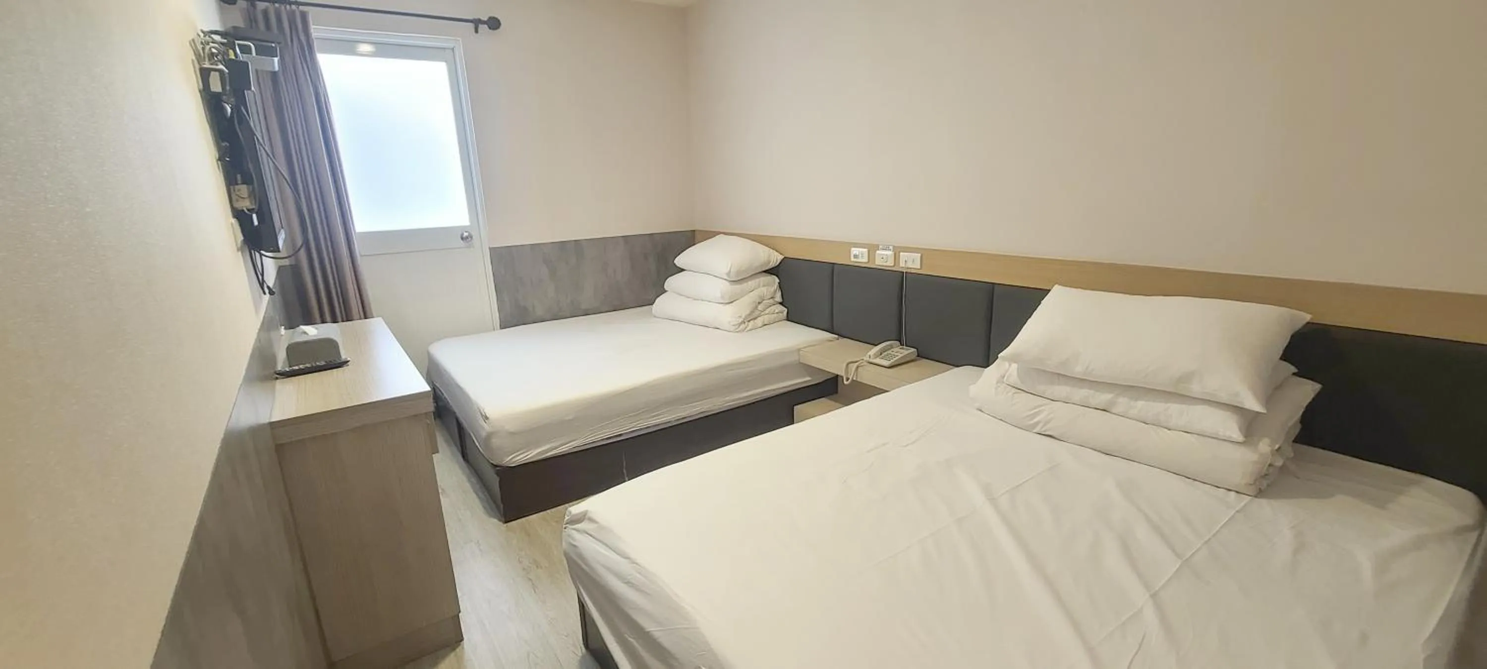 Bed in Chao She Hotel