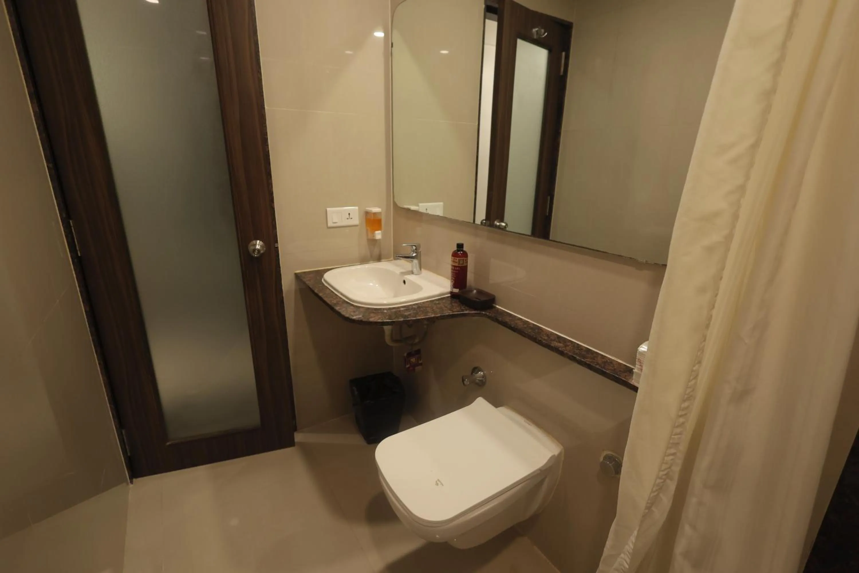 Bathroom in Hotel Vetro Inn