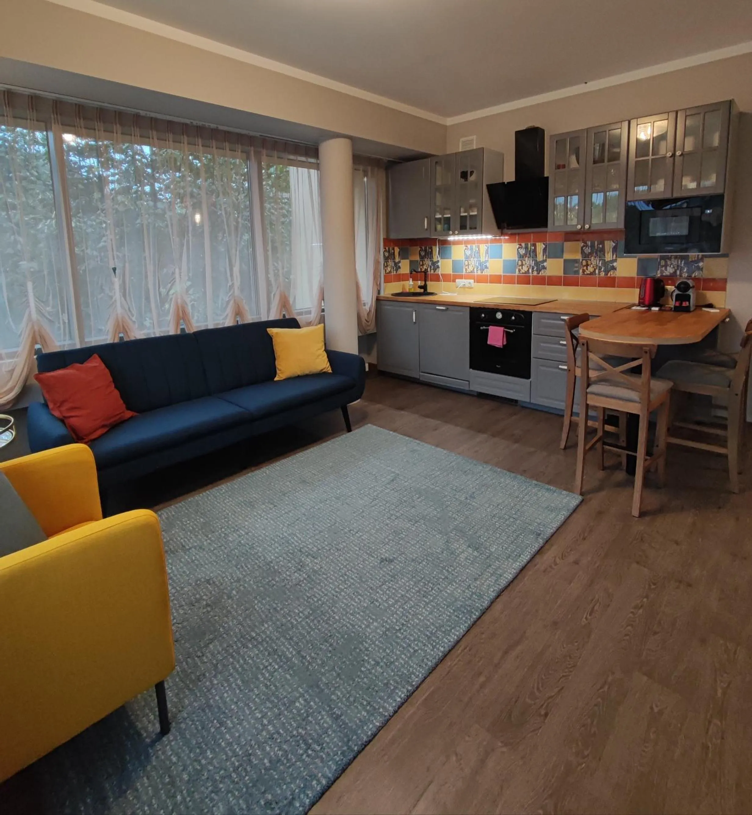 Seating area in Saules Club Apart Hotel