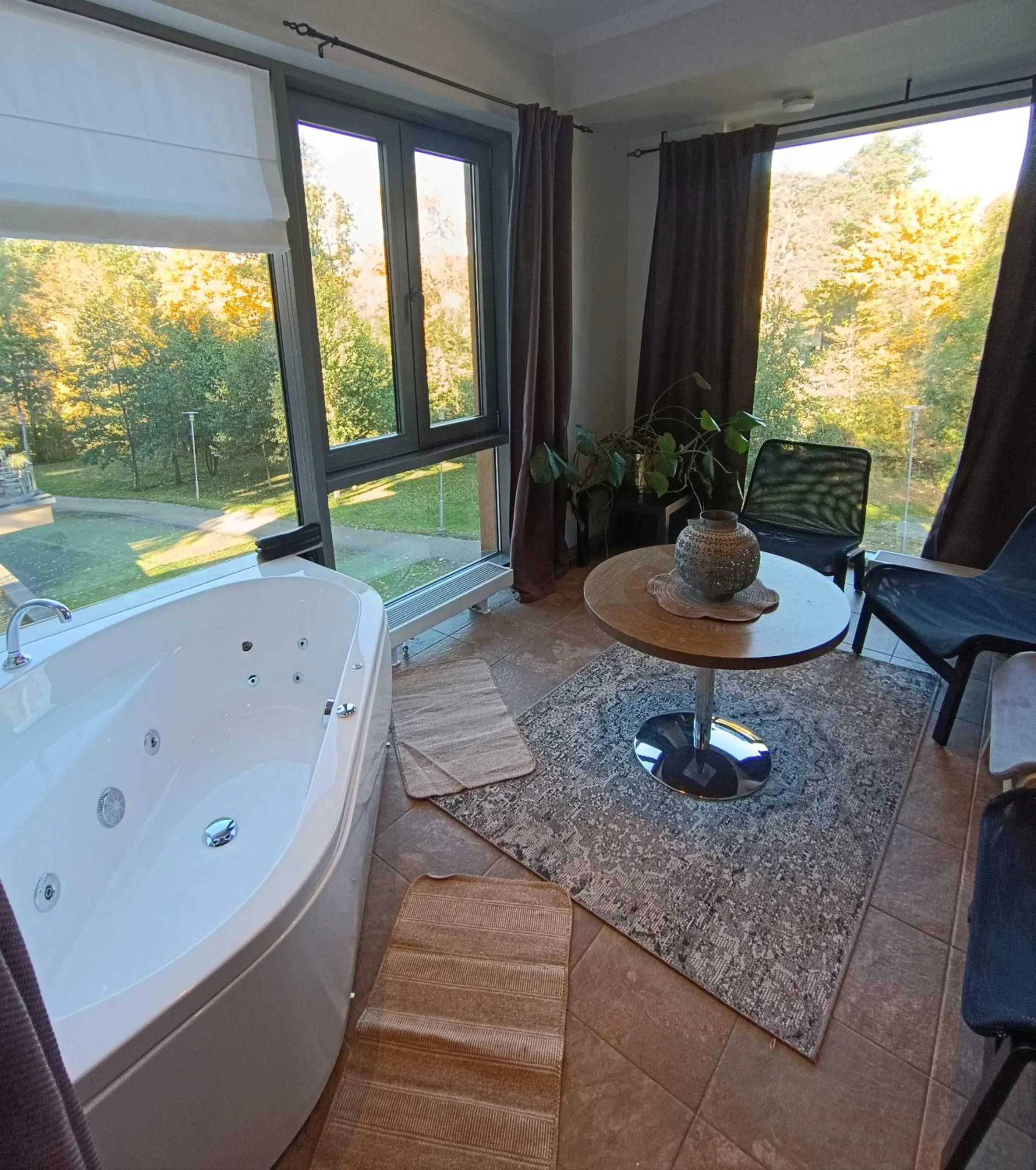 Seating area in Saules Club Apart Hotel