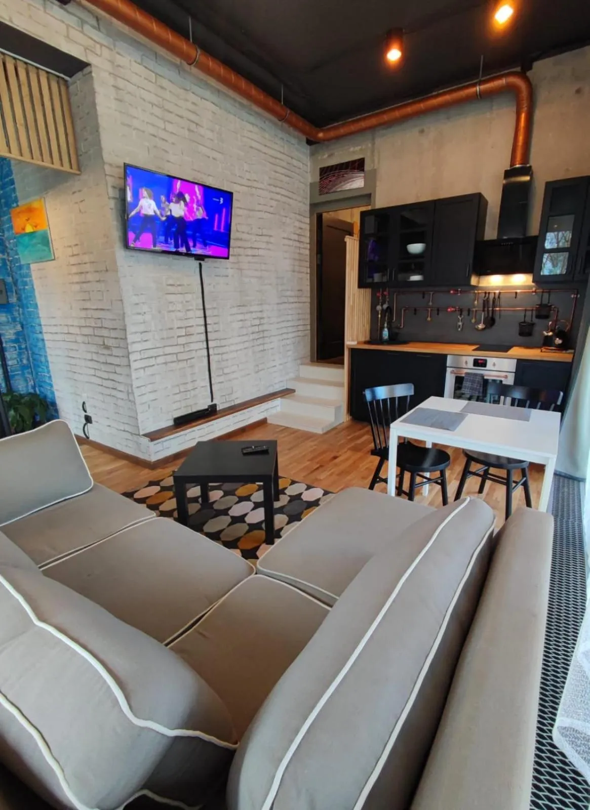 TV and multimedia in Saules Club Apart Hotel