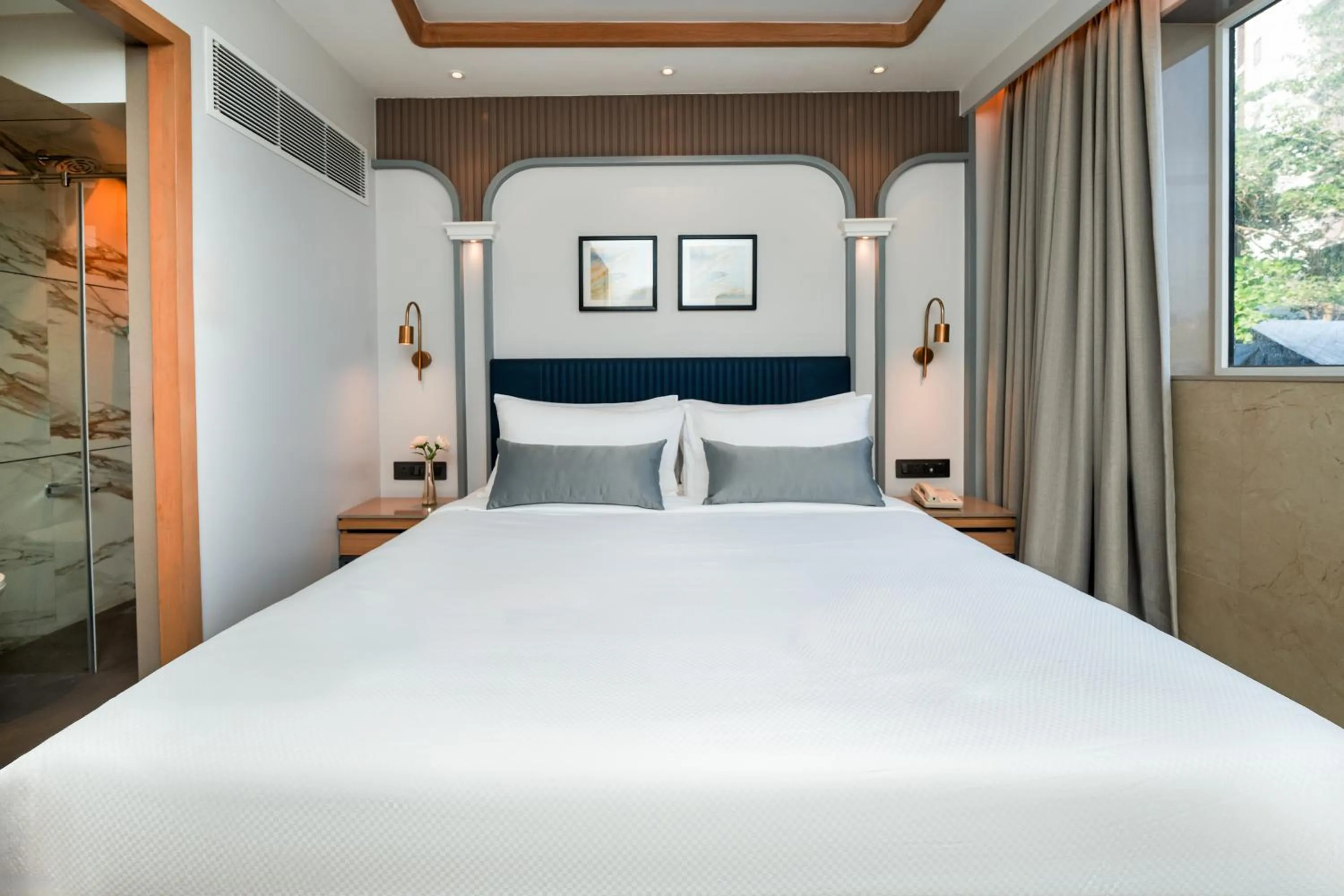 Bed in Ajanta Continental-Mumbai Airport