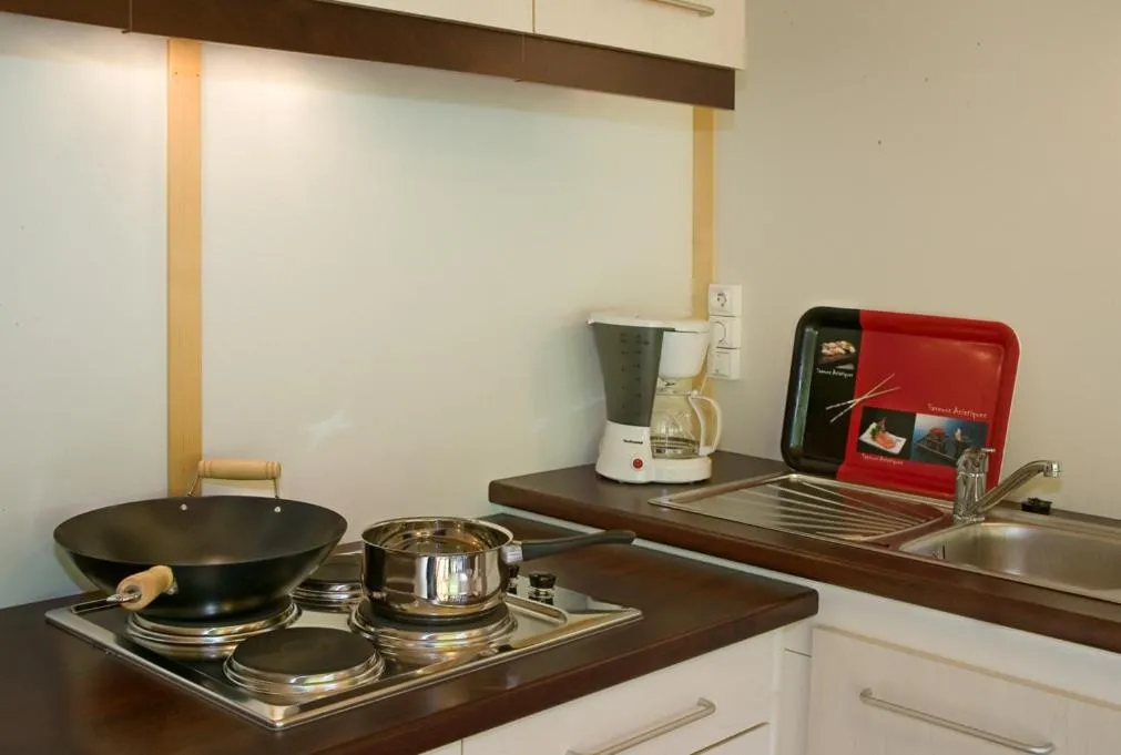 Kitchen or kitchenette in Village de Gite - La Cascade