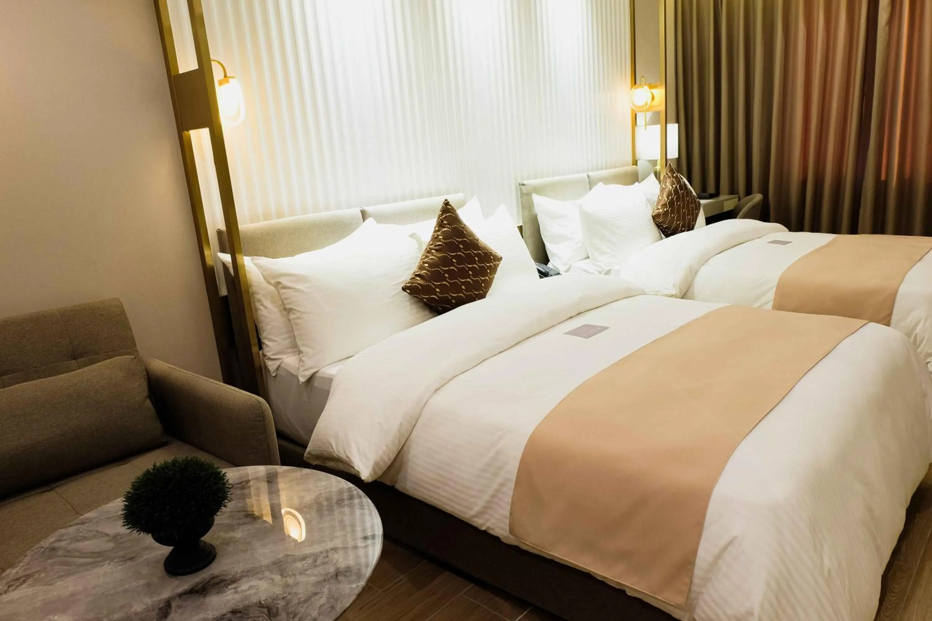 Bed in Uma Hotel and Residences