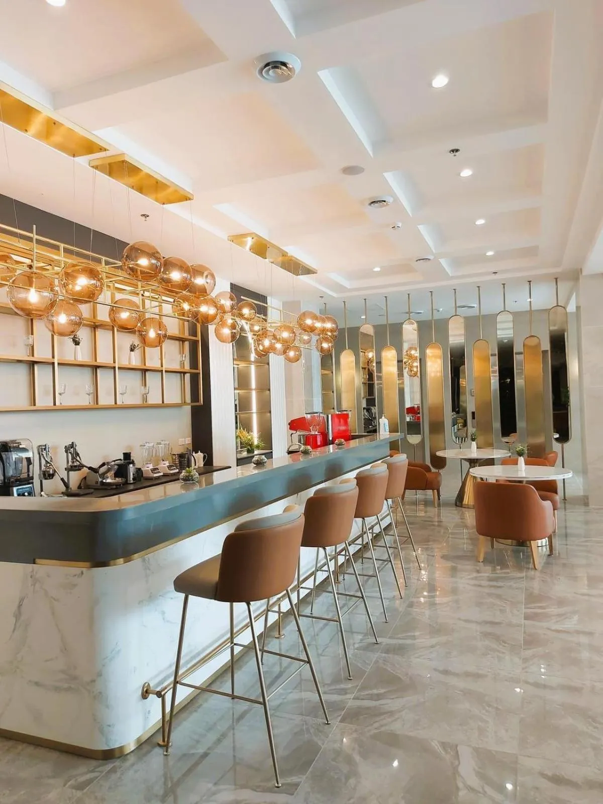 Lounge or bar in Uma Hotel and Residences