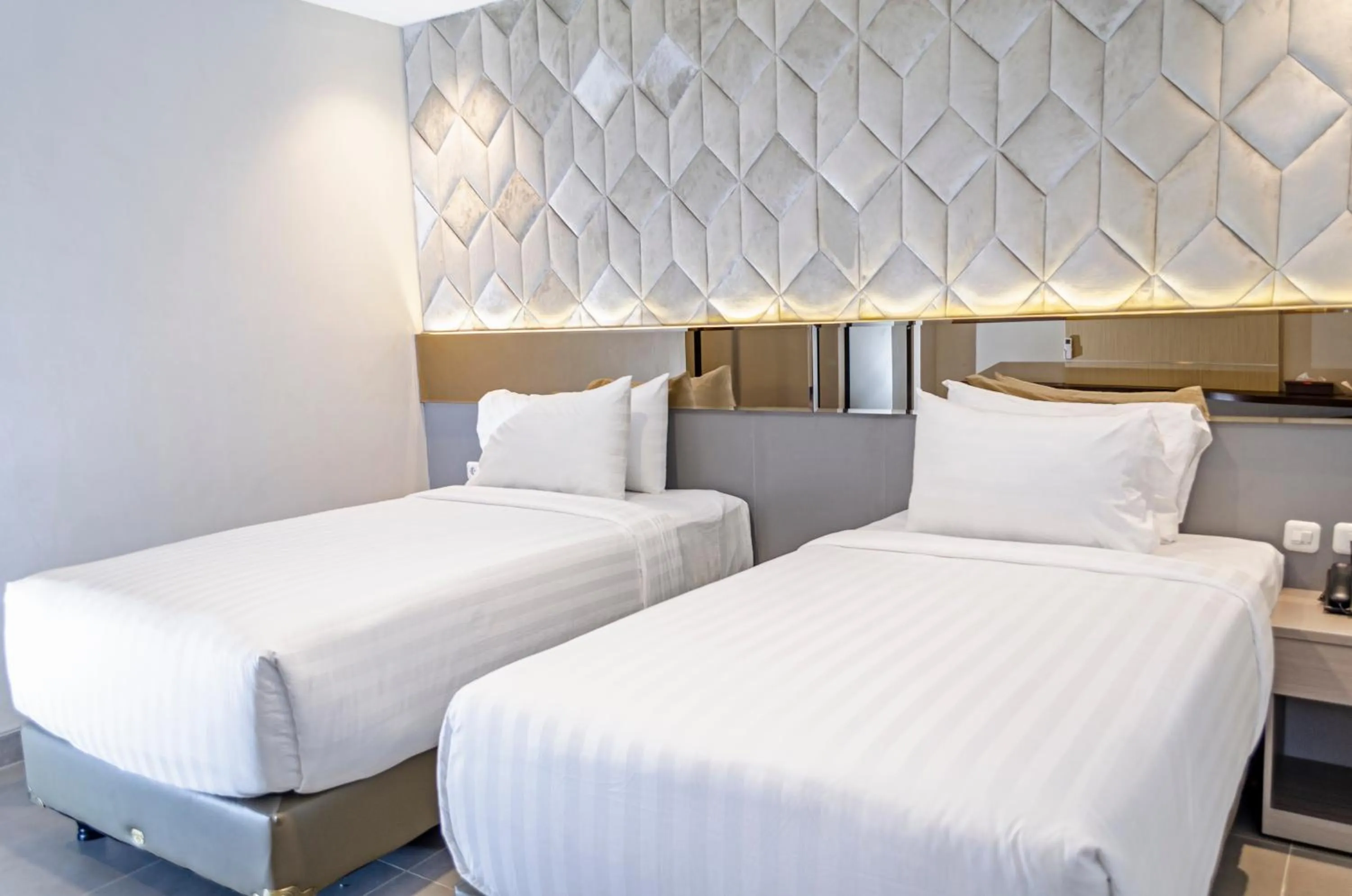 Bed in Arcadia Hotel Manado