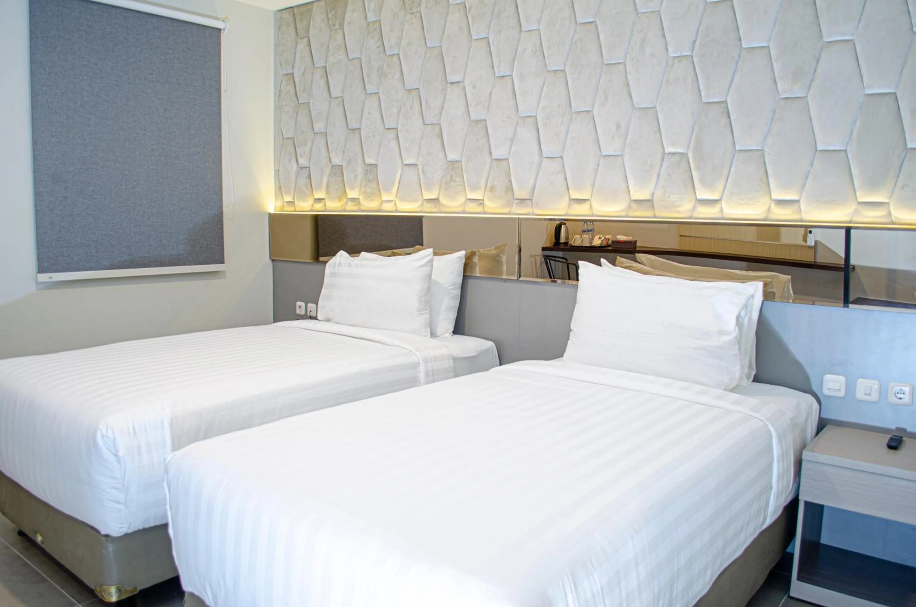 Bed in Arcadia Hotel Manado