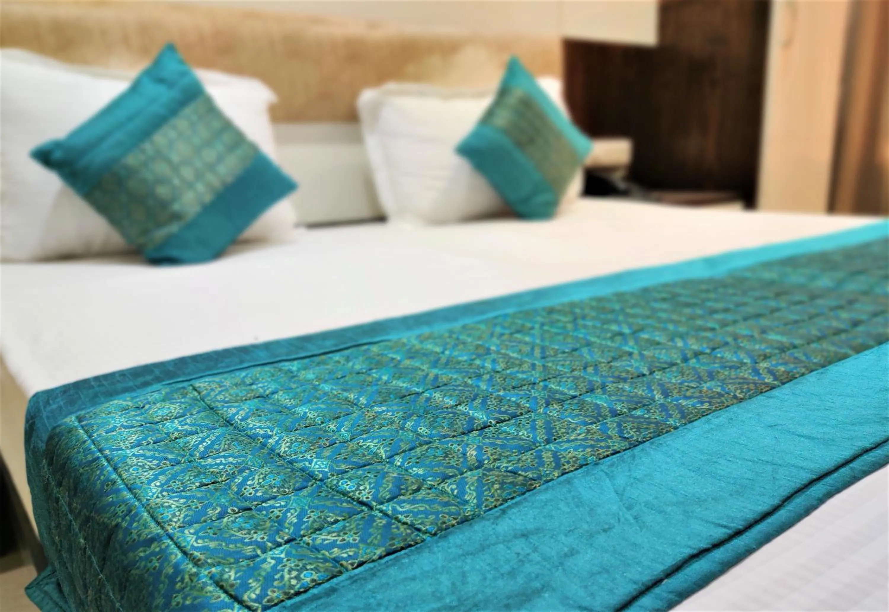 Bed in Raj Mahal Inn