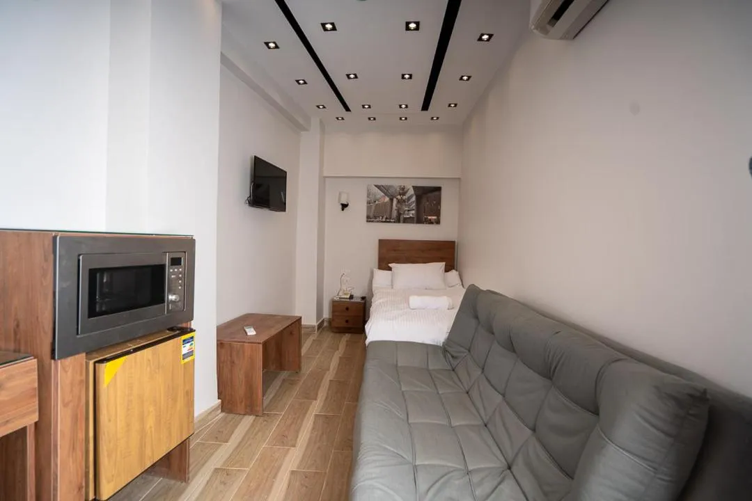 Bed in Sun and Sand Guest House