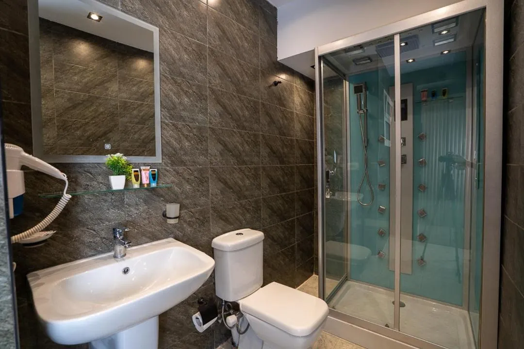 Bathroom in Sun and Sand Guest House