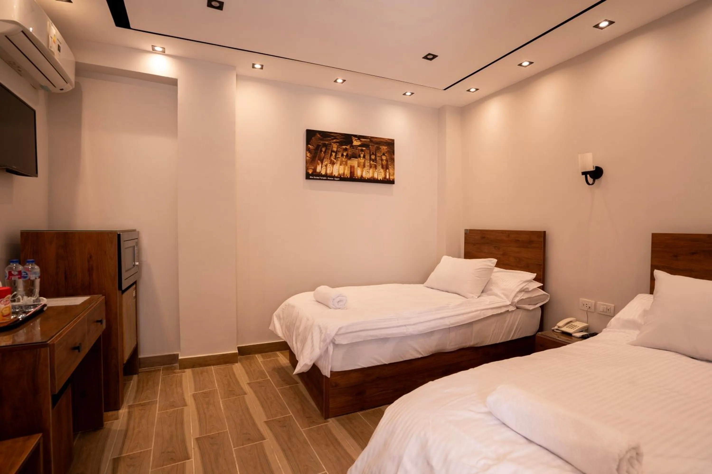 Bed in Sun and Sand Guest House