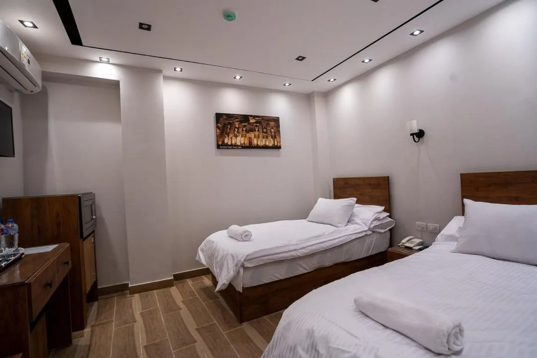 Bed in Sun and Sand Guest House