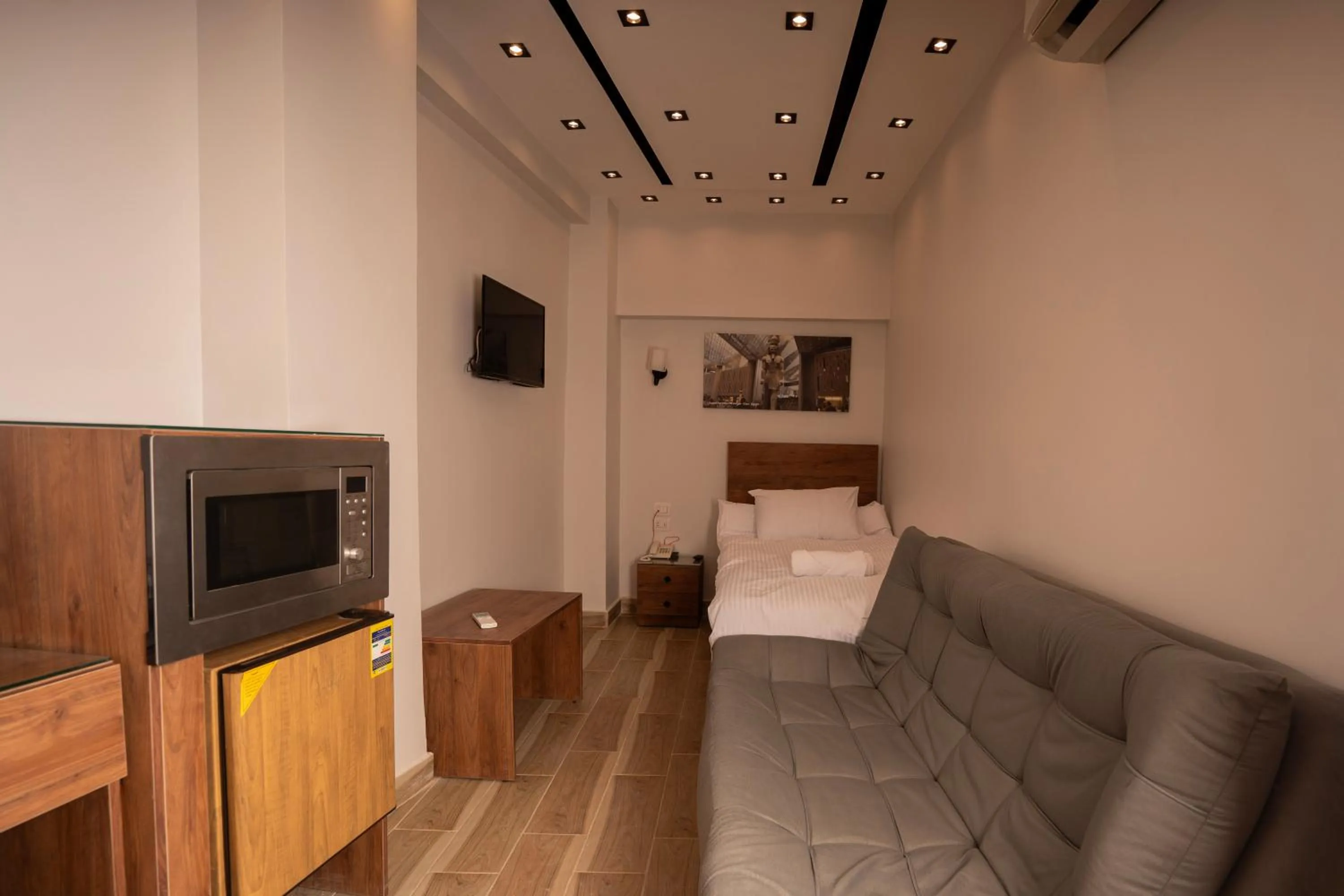 Bed in Sun and Sand Guest House