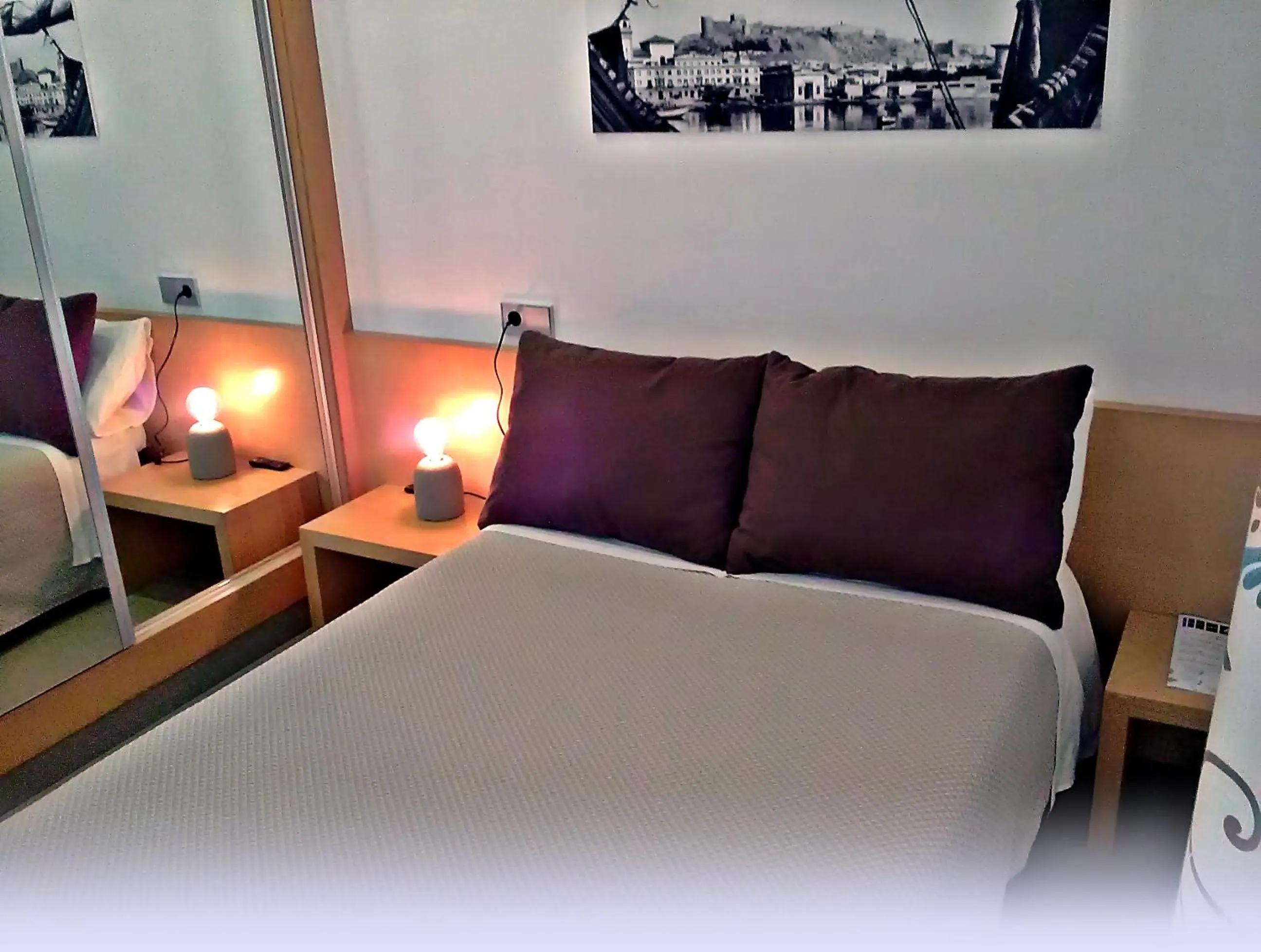 Bed in Hotel Alboran