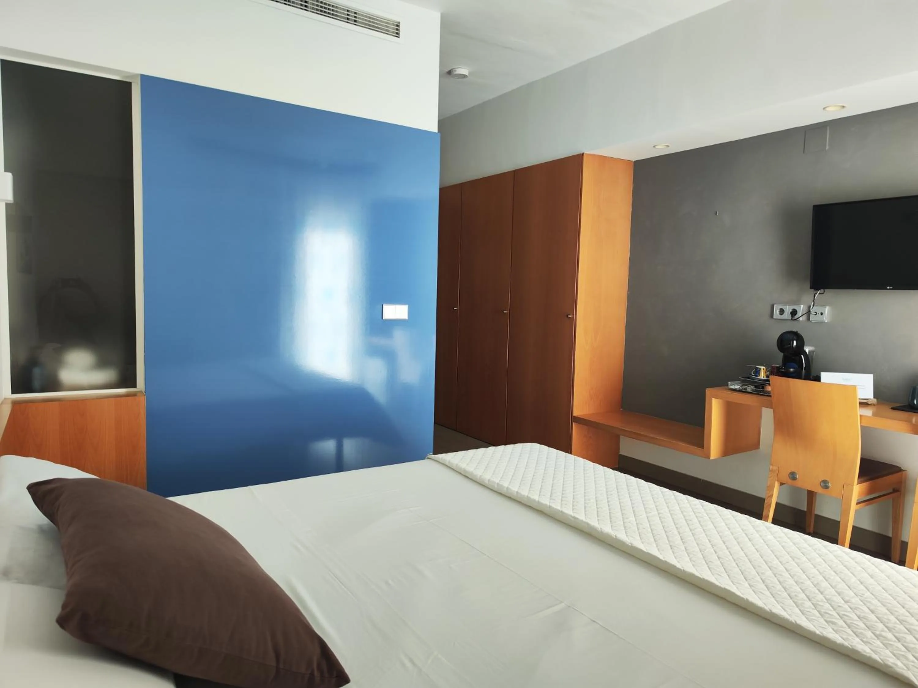 Bed in Hotel Alboran