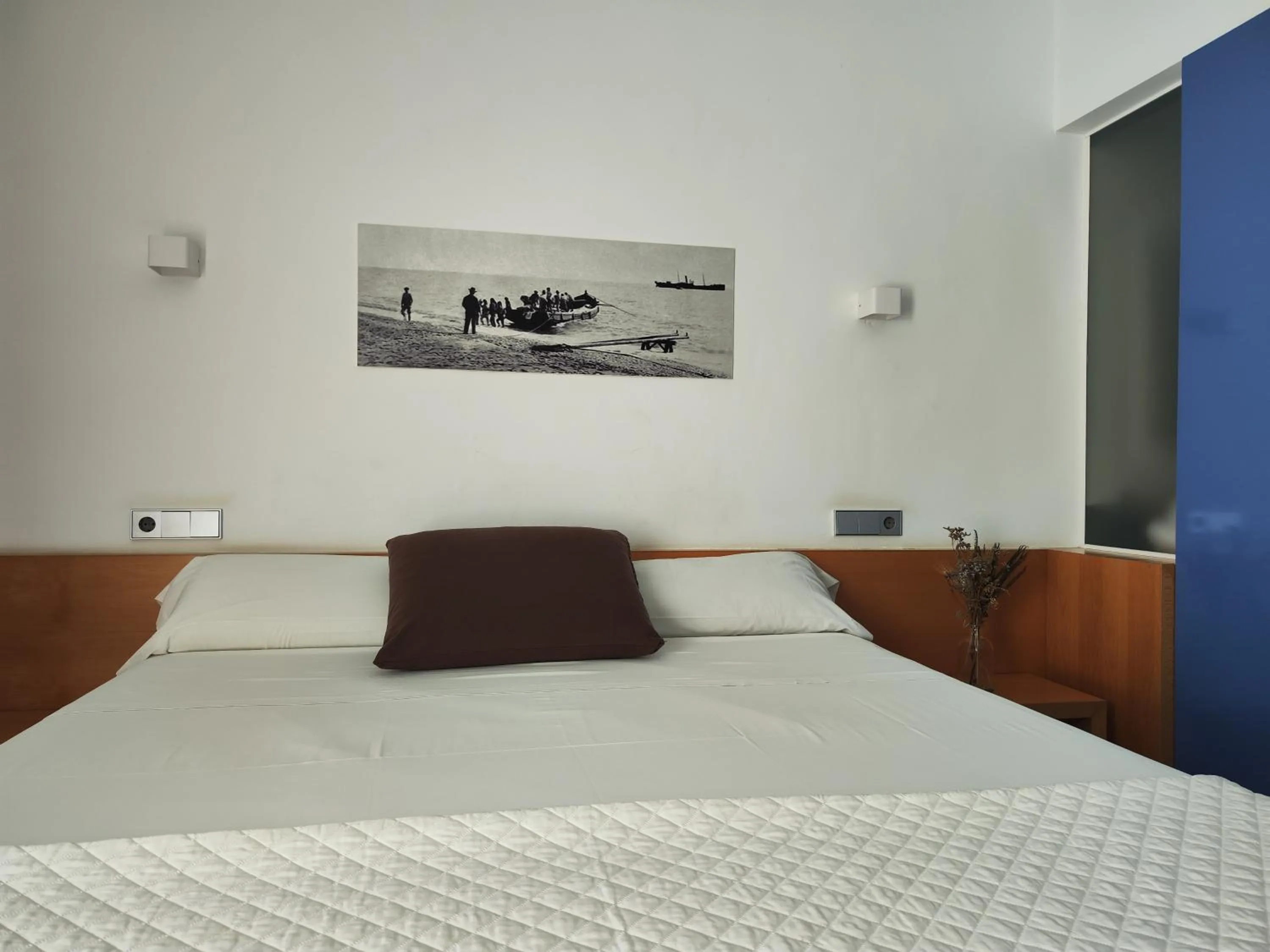 Bed in Hotel Alboran