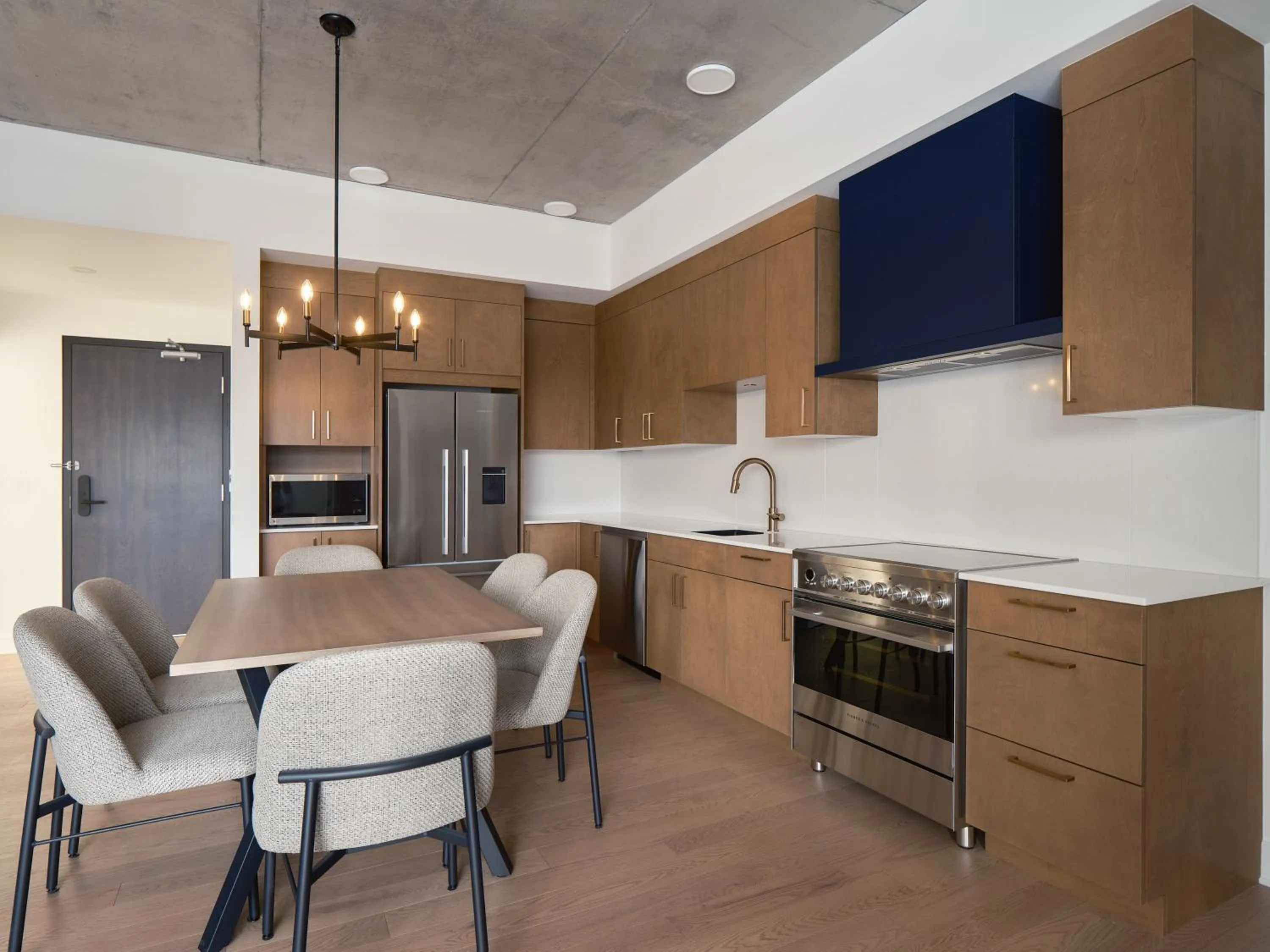 Kitchen or kitchenette in Hôtel Expérience - Quartier Des Marinas