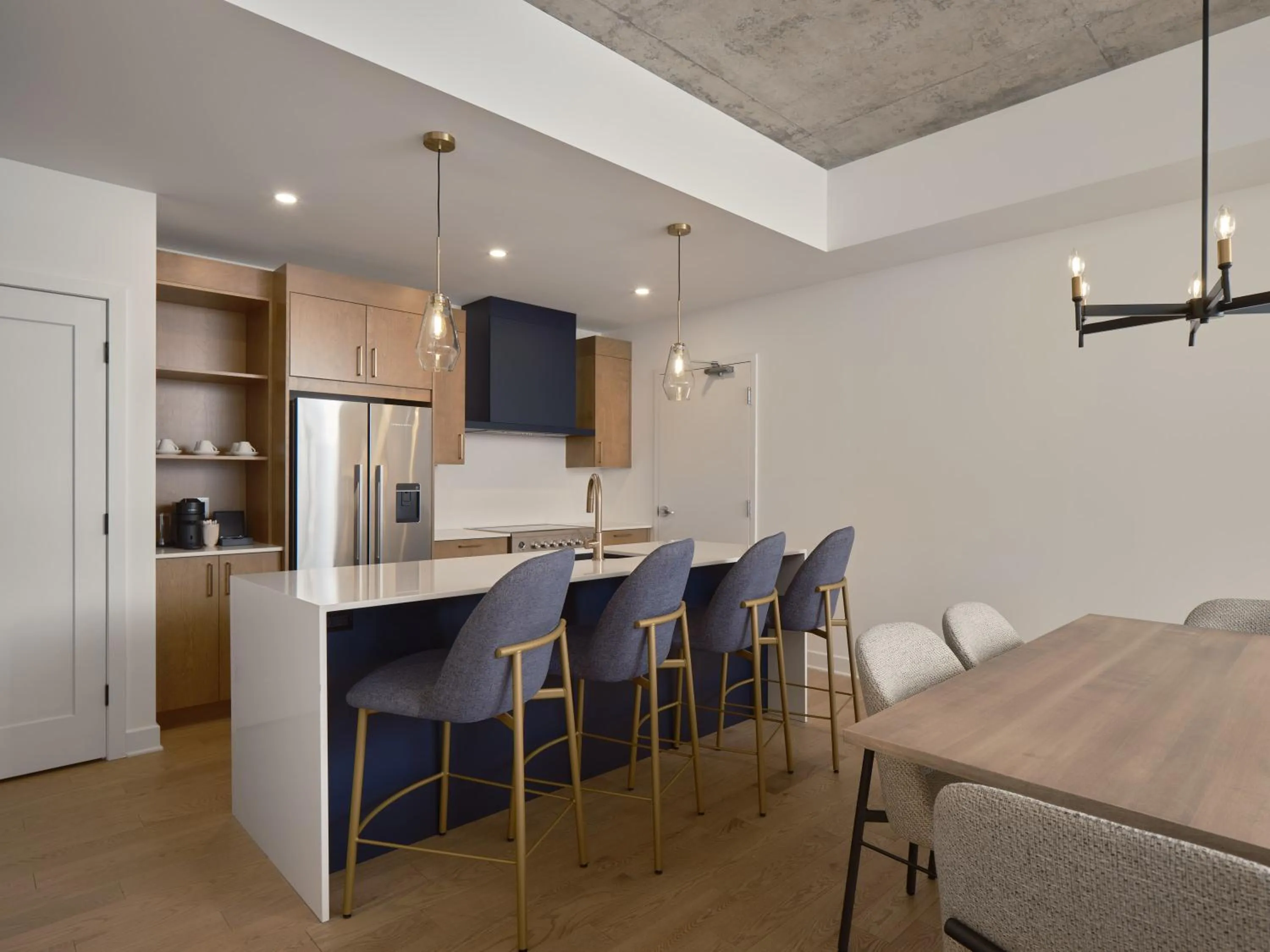 Kitchen or kitchenette in Hôtel Expérience - Quartier Des Marinas