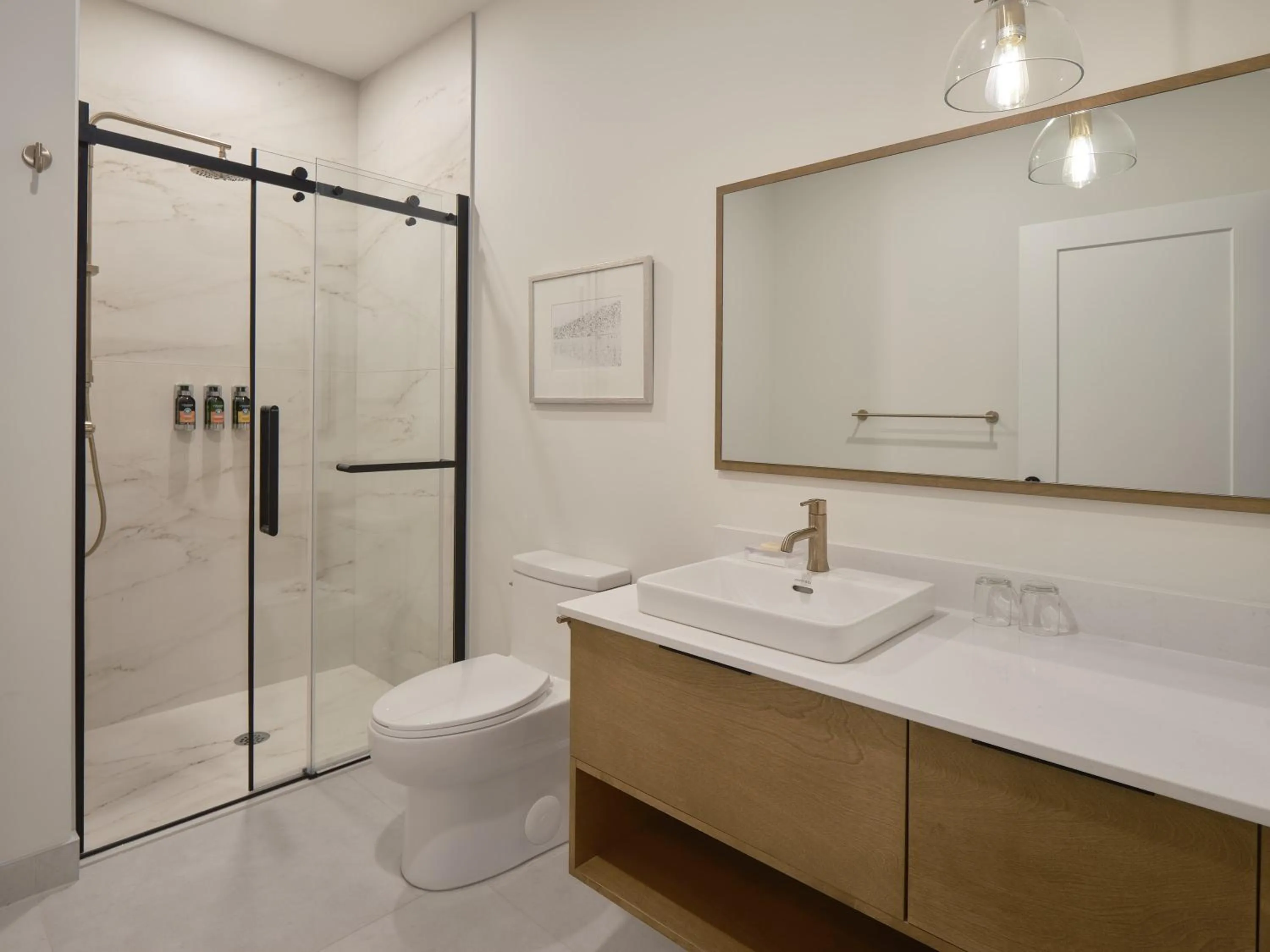 Shower in Hôtel Expérience - Quartier Des Marinas