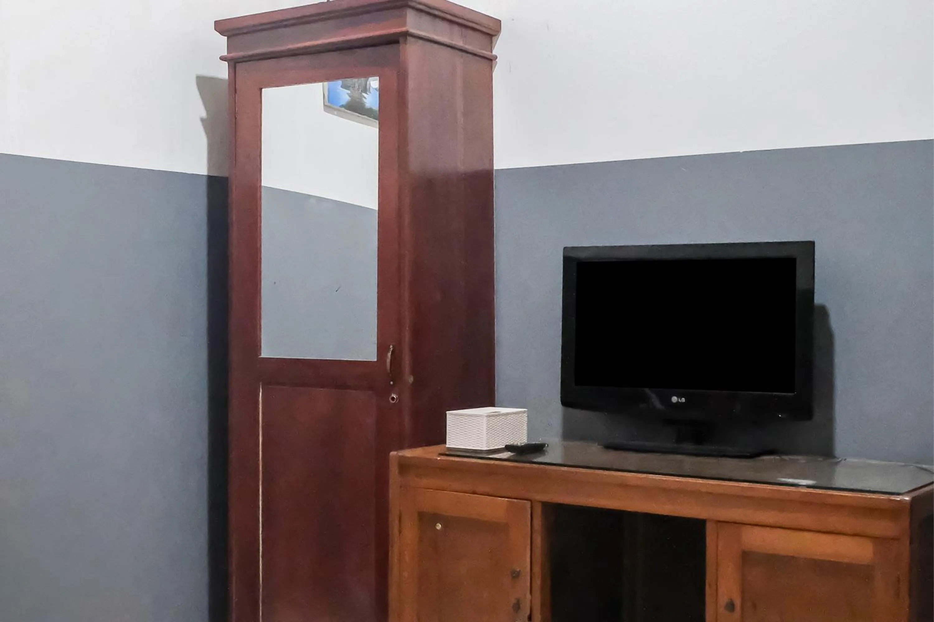 Bedroom in OYO 93117 Penginapan Tiga Dara