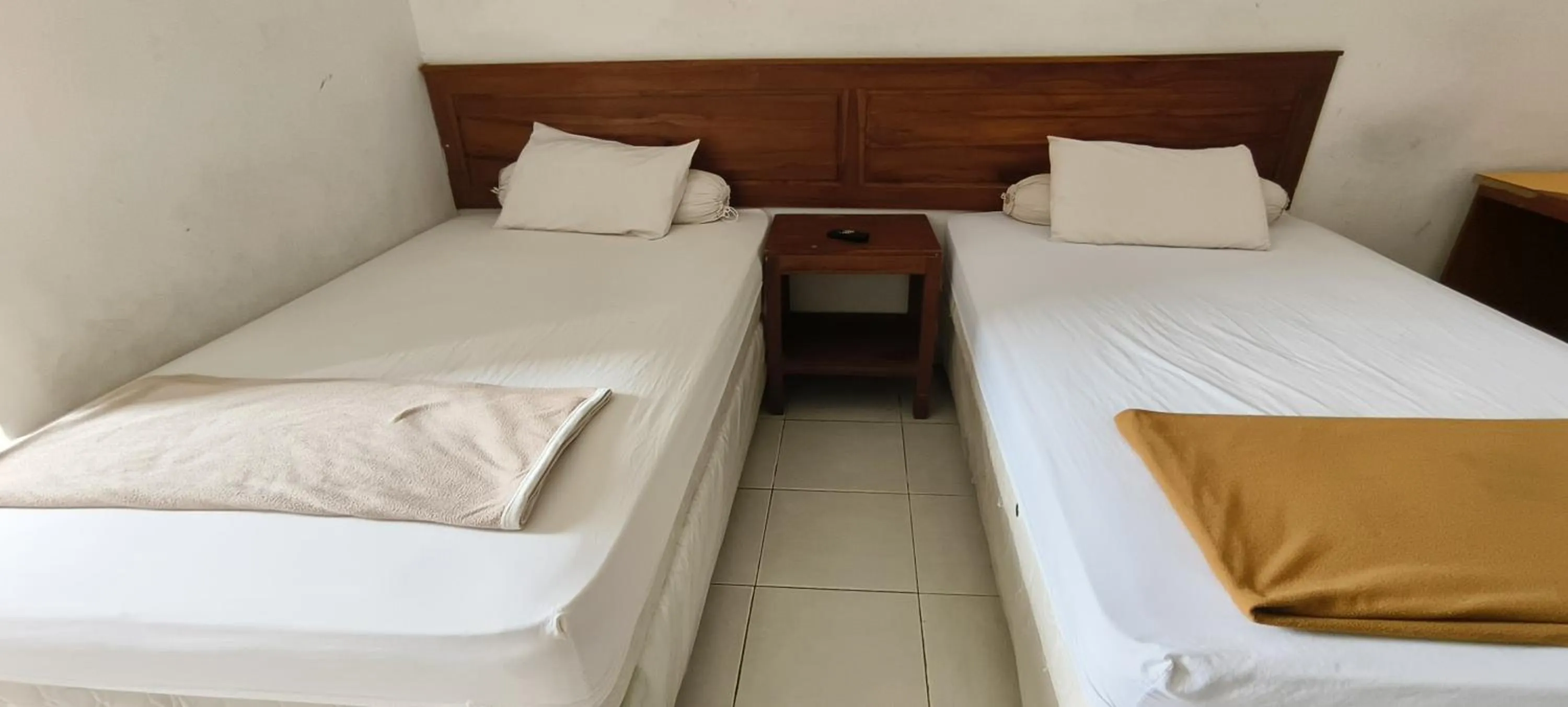 Bedroom, Bed in Hotel O Wisma Hamalau SyariahNearPulau Bromo Pedestrian Bridge