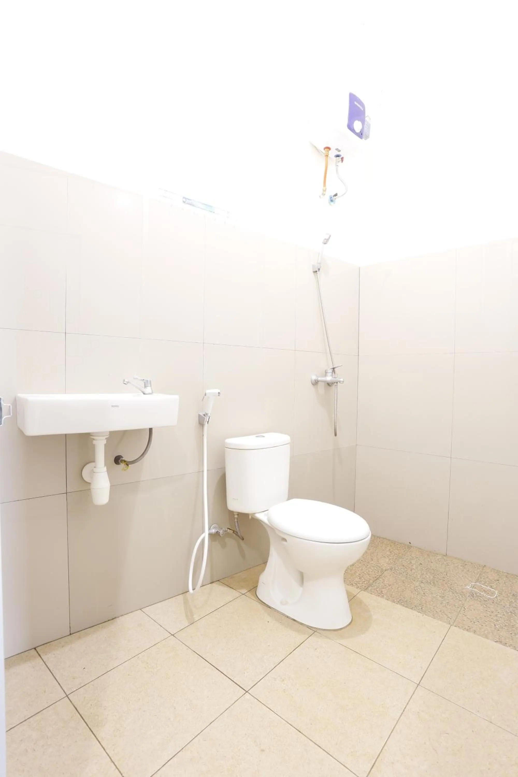 Bathroom in Hotel O Penginapan Budhe Sri