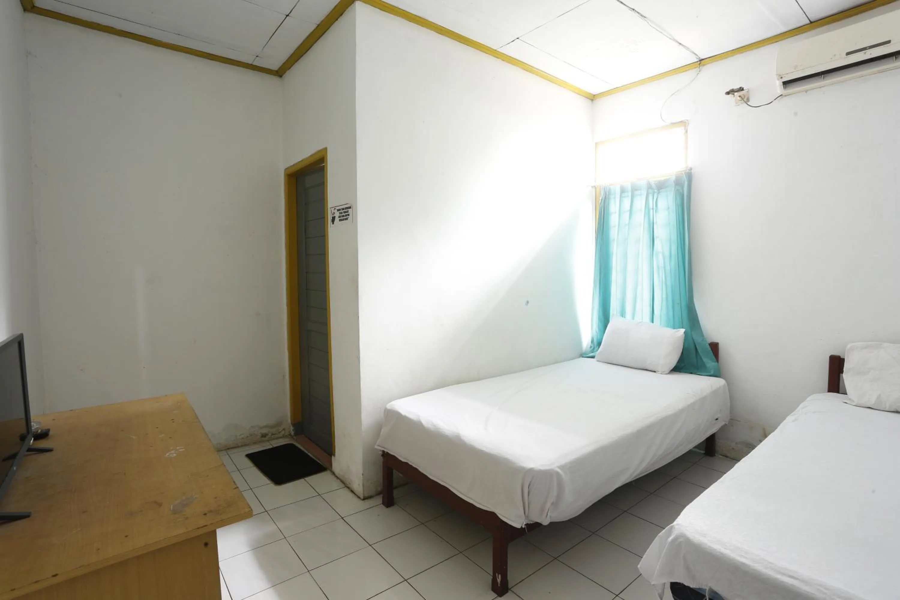 Bedroom, Bed in Hotel O Penginapan Budhe Sri