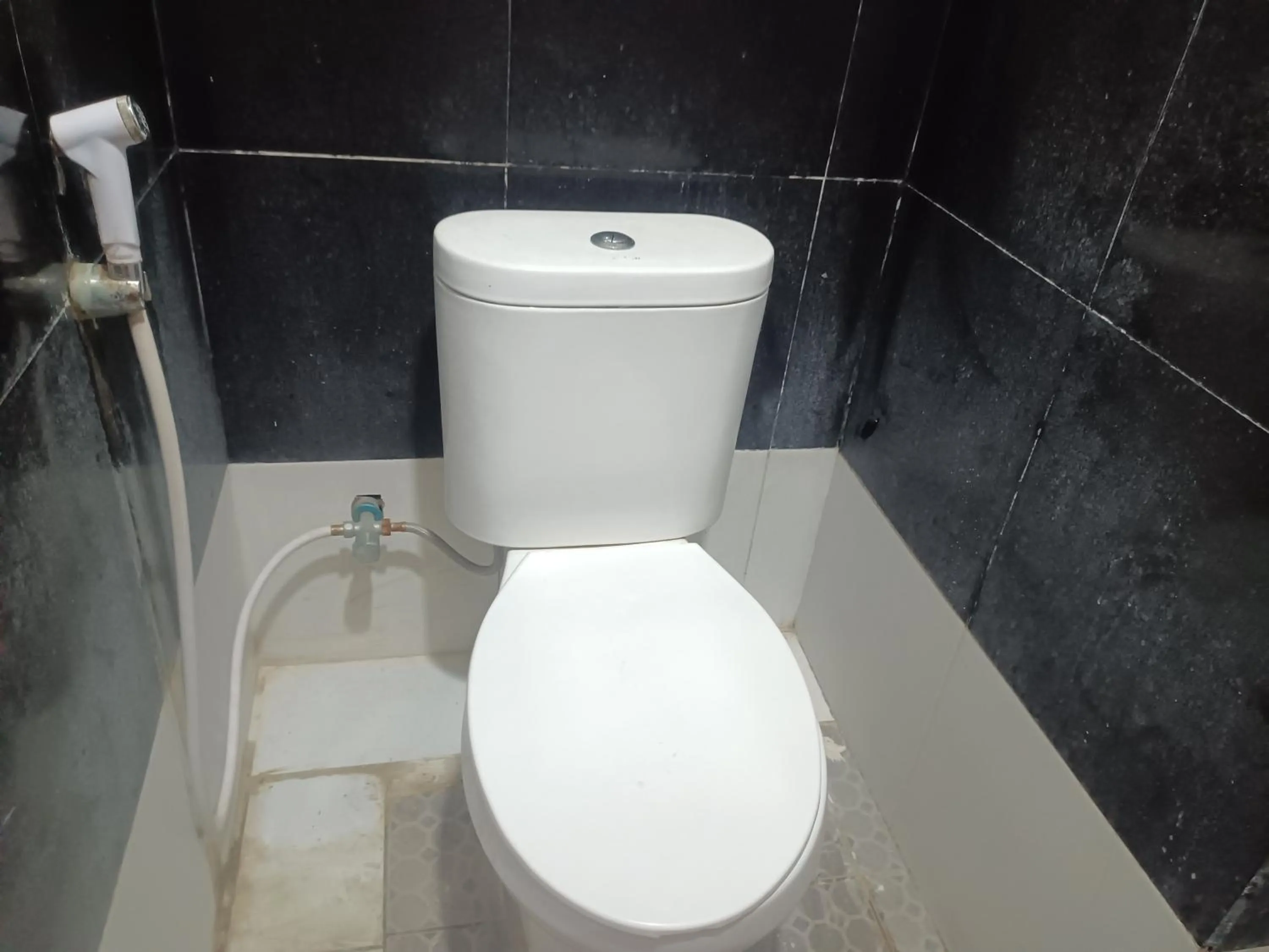 Bathroom in OYO 93090 Multi Plus Inn