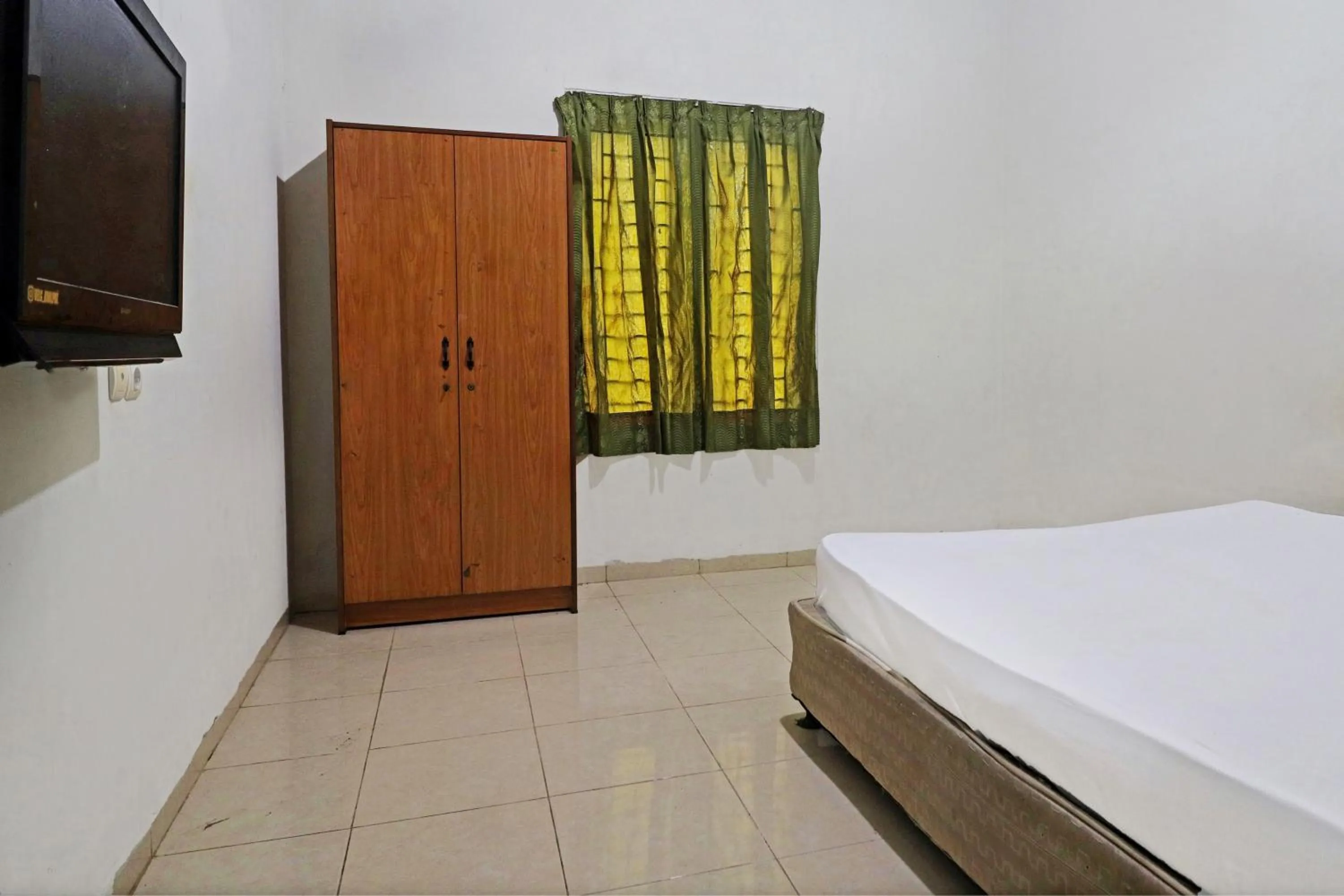 Bedroom, Bed in Hotel O Arizona Homestay