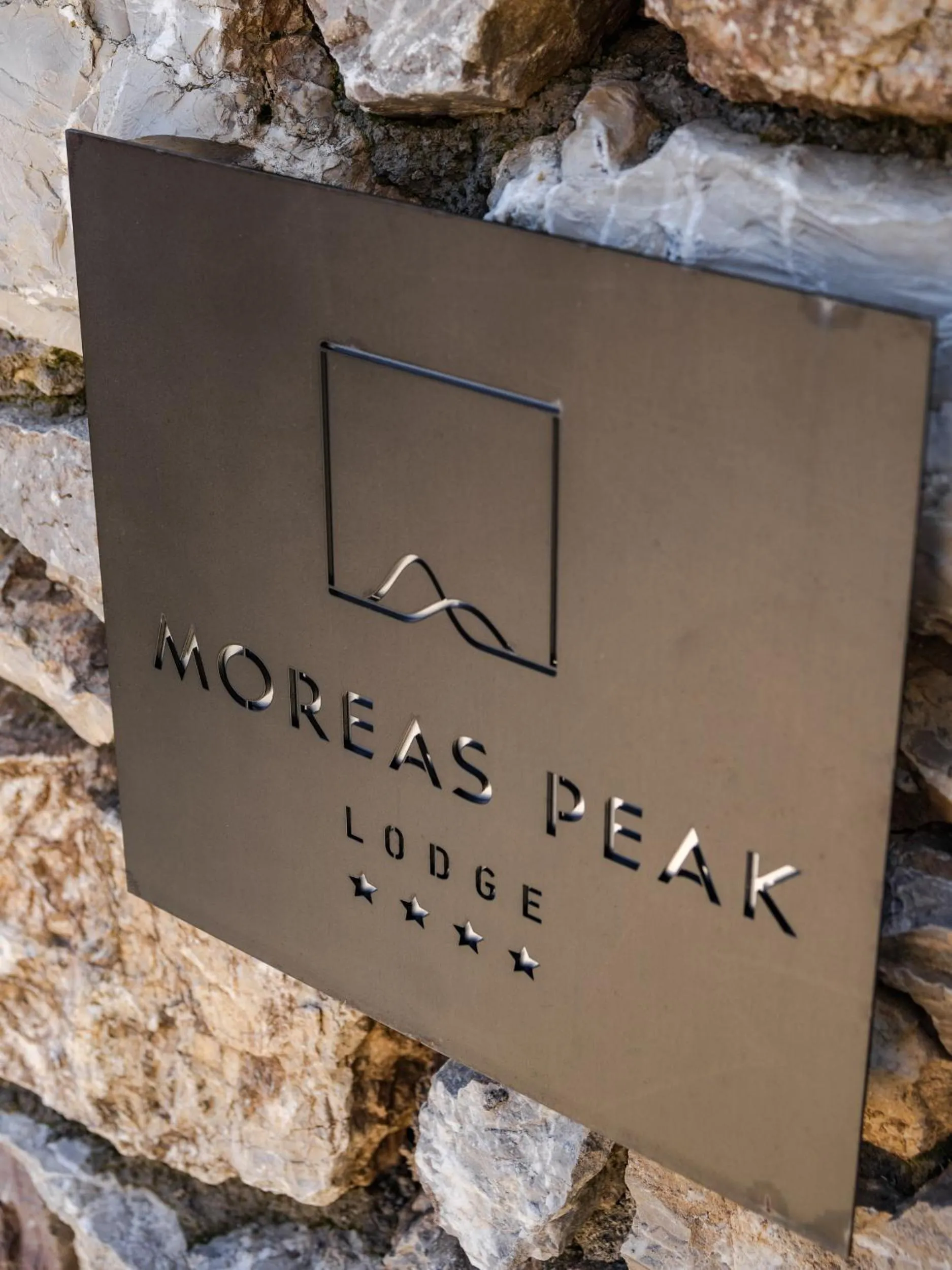Property logo or sign in Moreas Peak Lodge