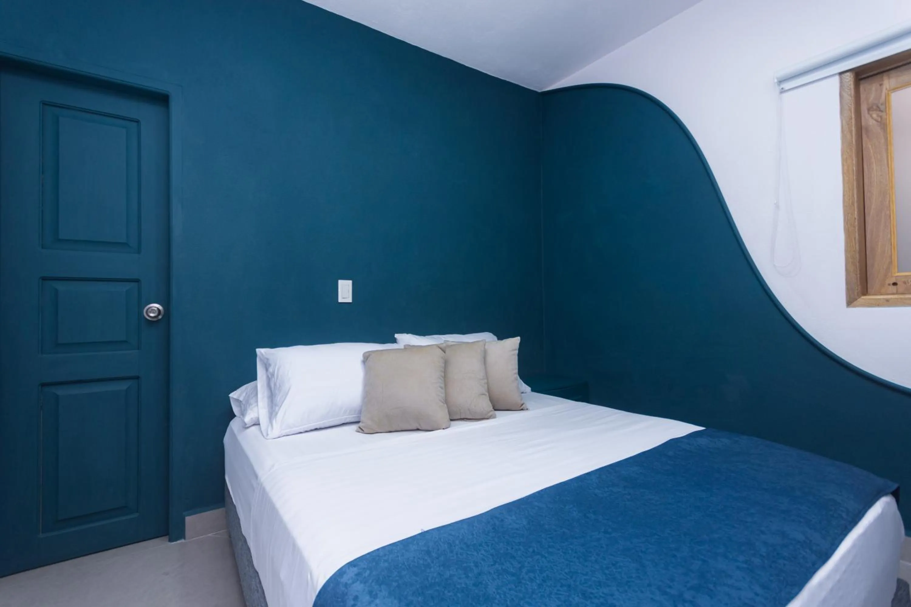 Bed in Hotel Chromatic