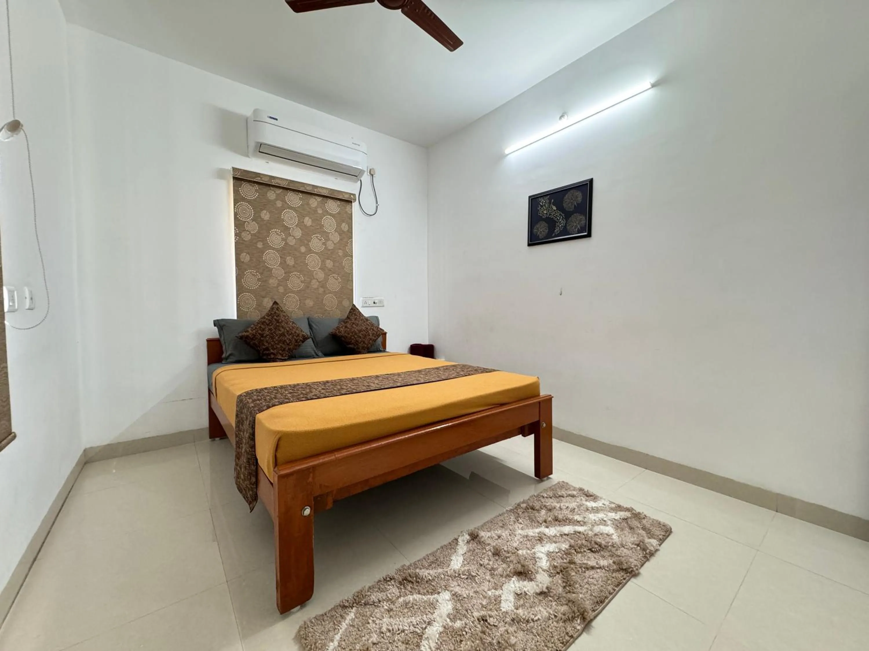 Bed in Royal Beach Service Apartment