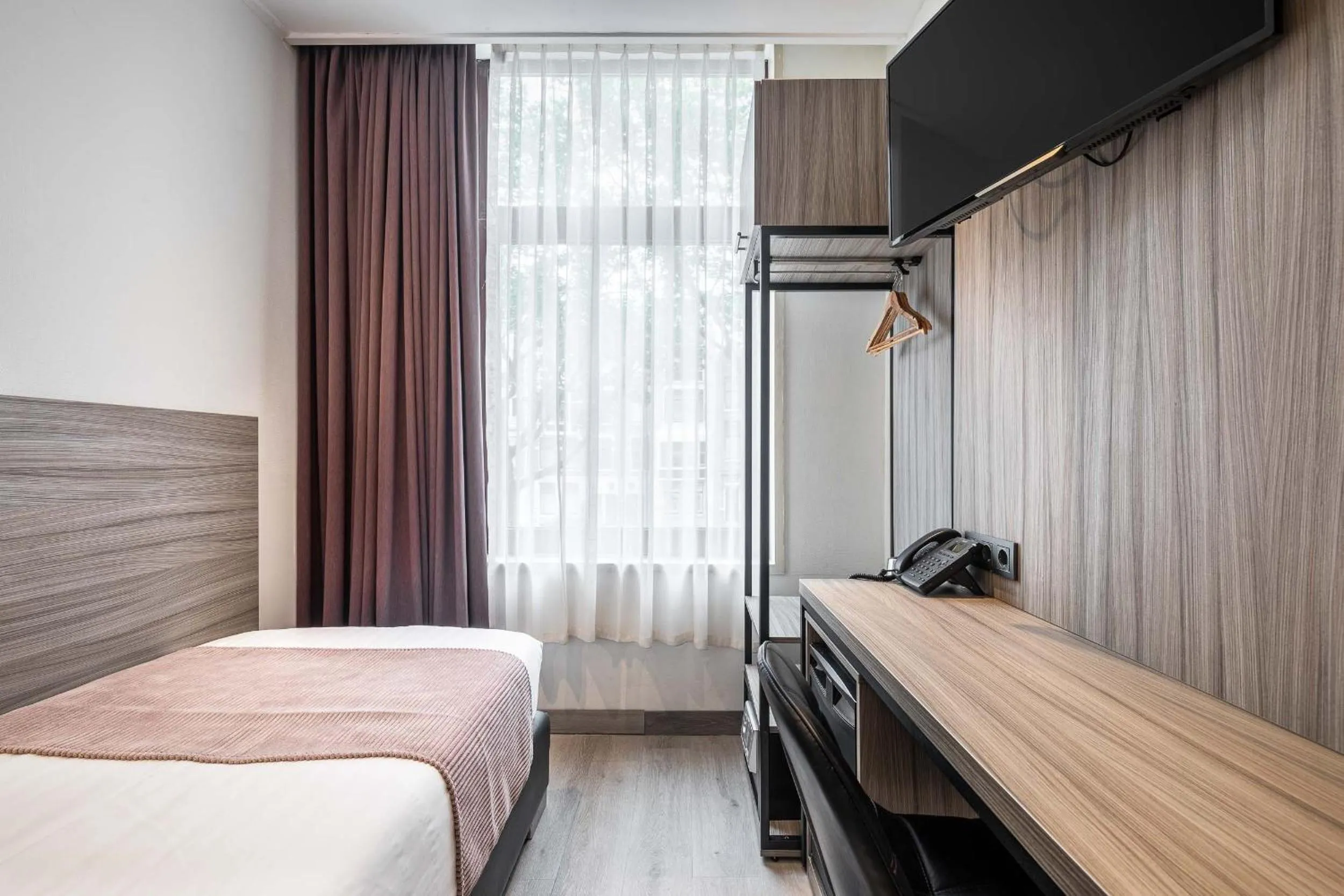 Bed in Boutique Hotel Milano Rotterdam-Centre