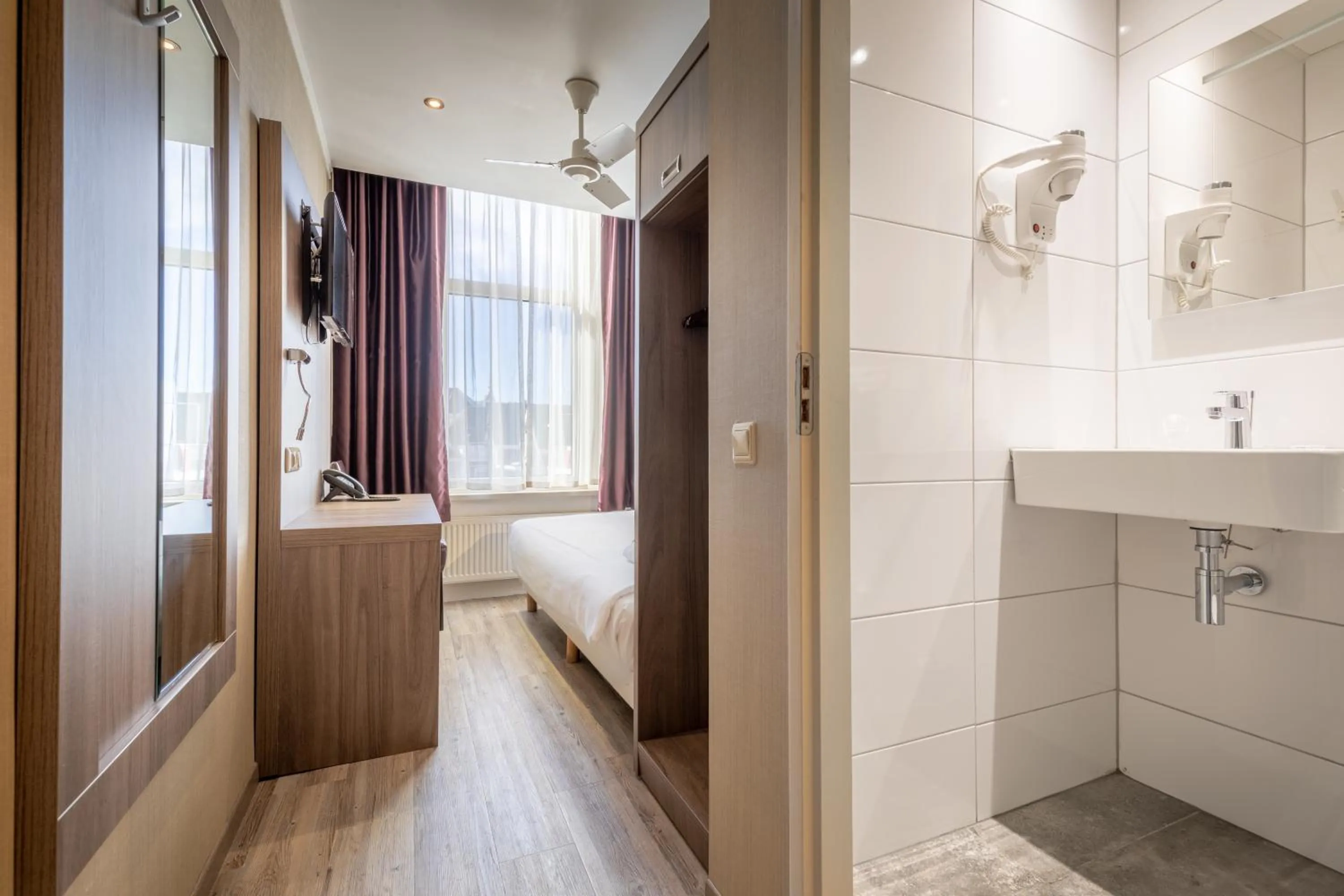 Bed in Boutique Hotel Milano Rotterdam-Centre