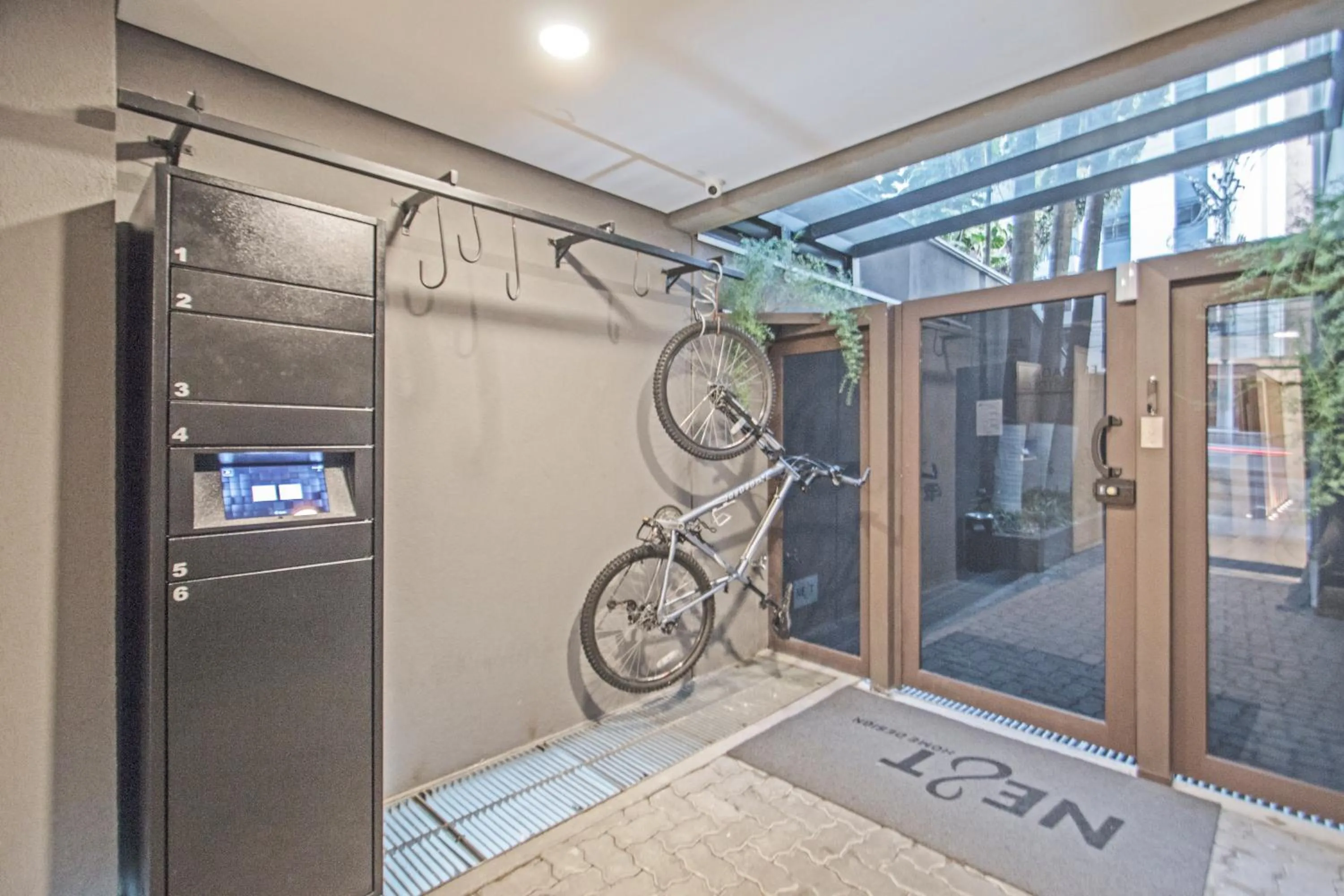 Cycling in Next Home Design by Viva - Apartamentos em prédio próximo ao Parque do Ibirapuera