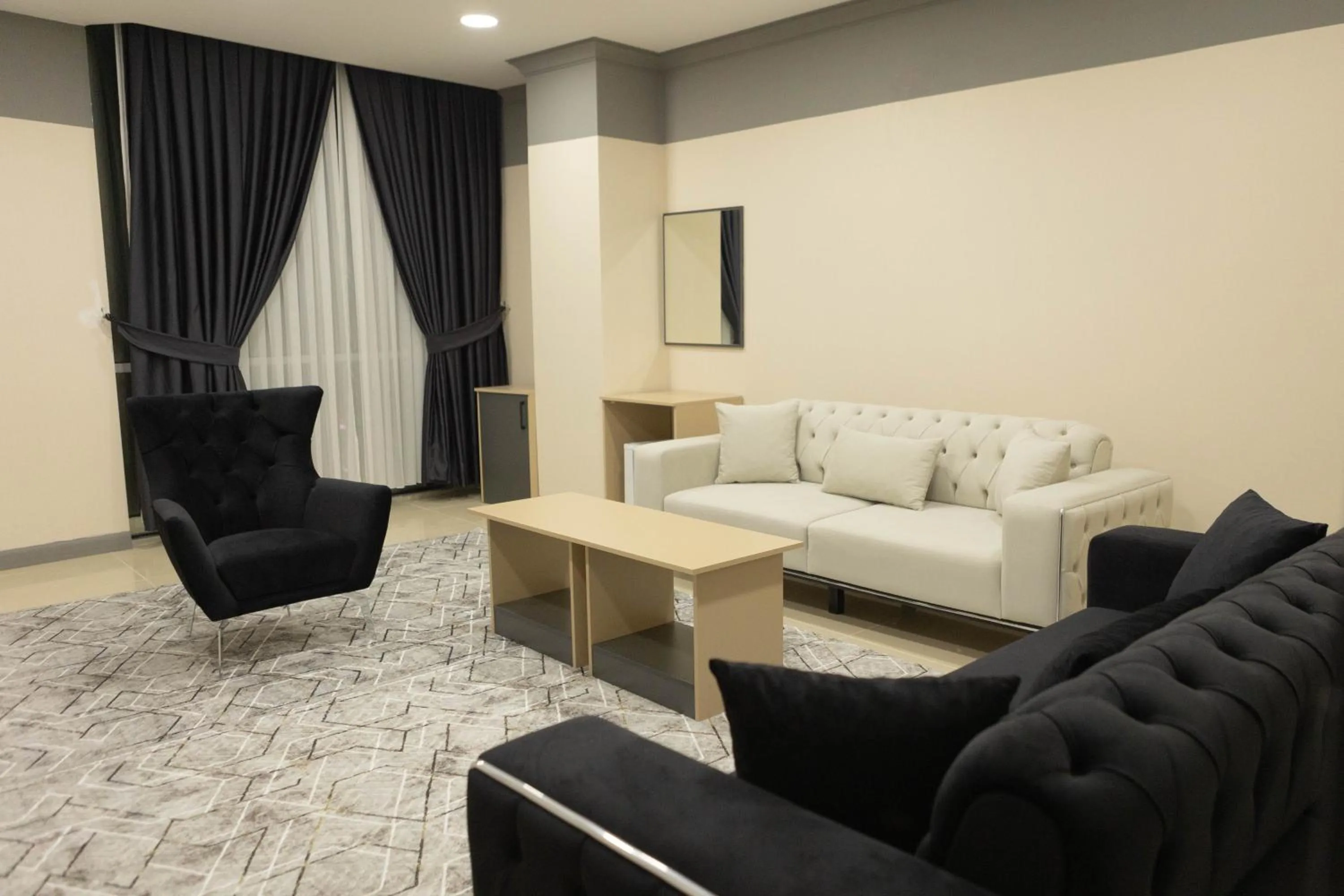 Living room in City Night Suites & Hotels