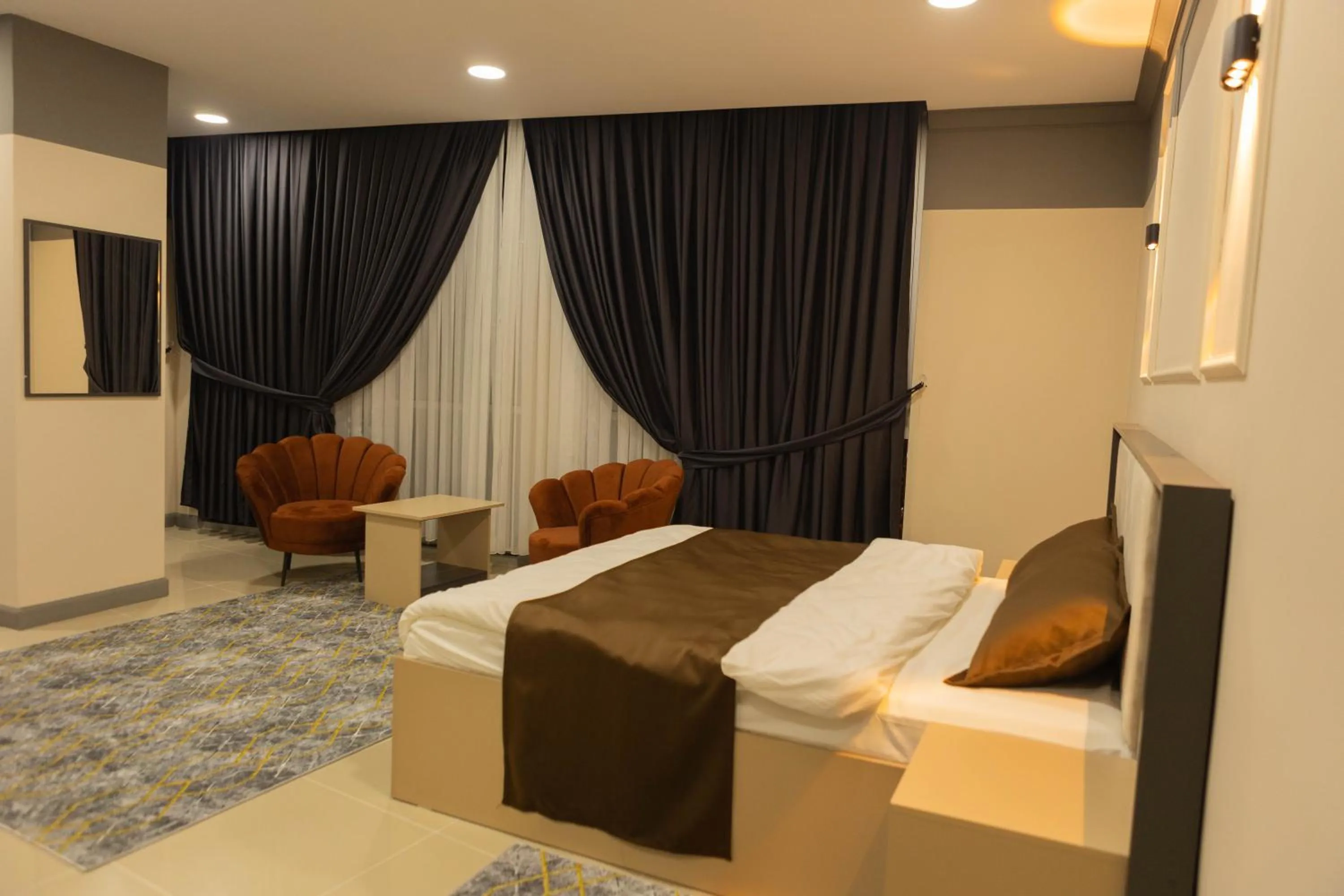 Photo of the whole room, Bed in City Night Suites & Hotels