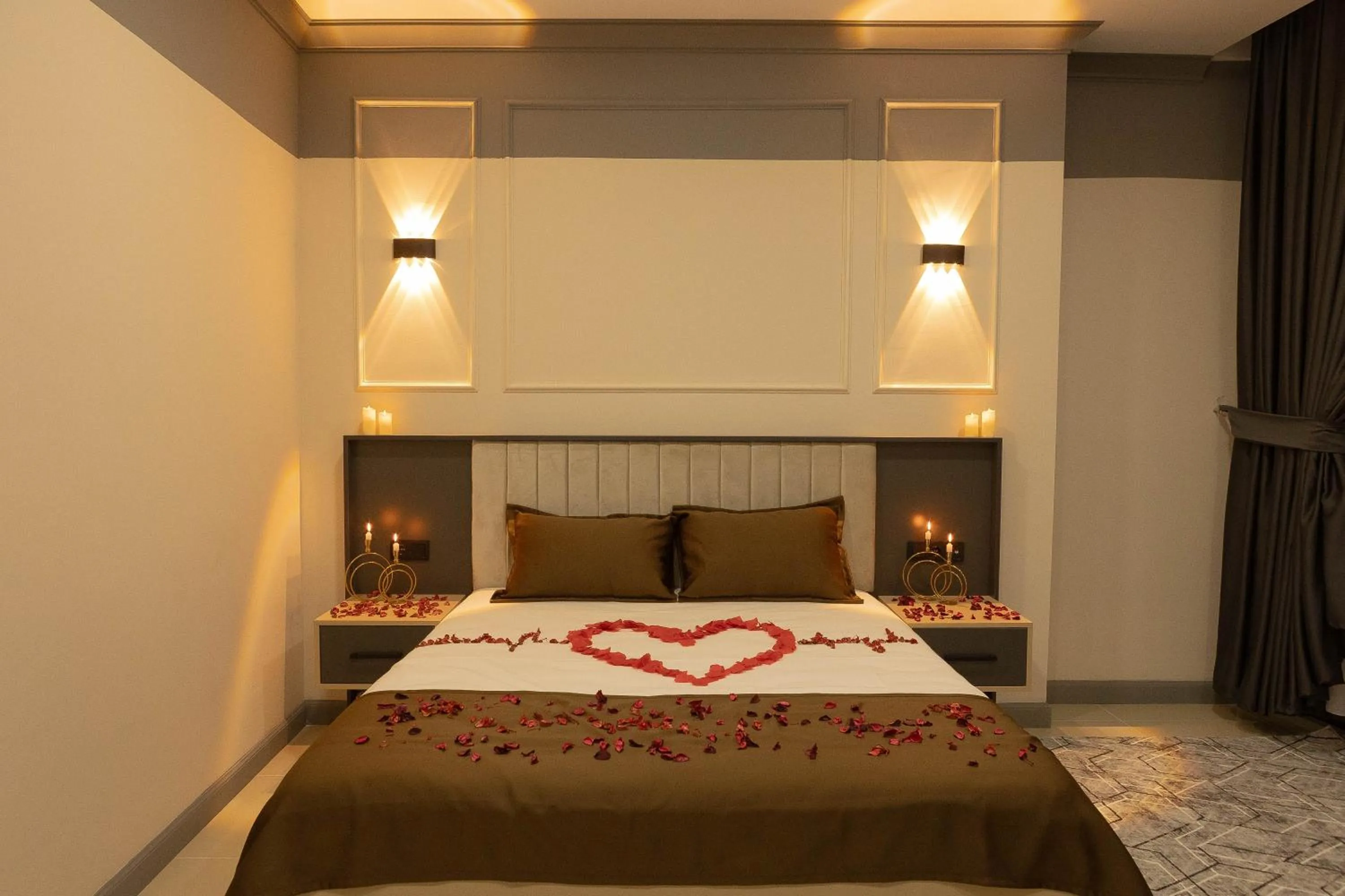 Bed in City Night Suites & Hotels