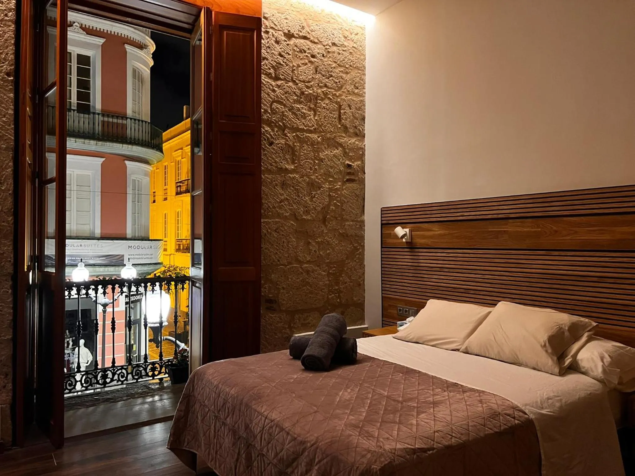 Bed in Triana Rooms EH